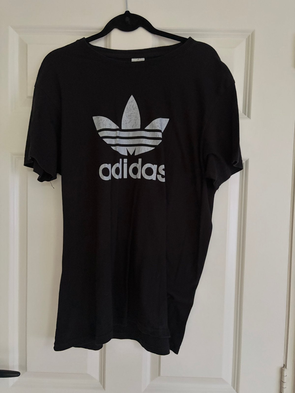 Zwart T-shirt met wit logo - Maat XL, Ophalen of Verzenden, Gedragen, Maat 56/58 (XL), Zwart