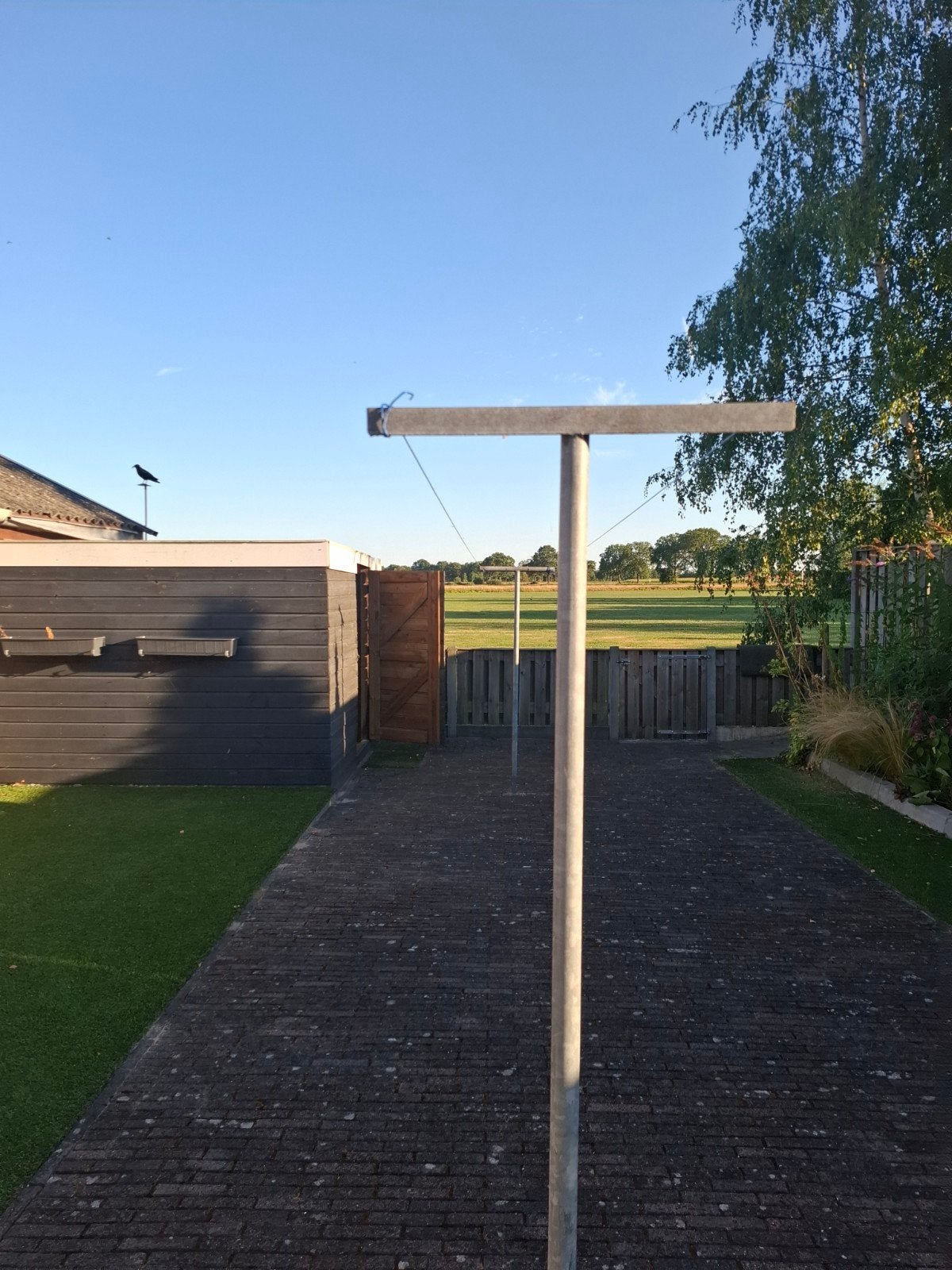 2 metalen waslijnpalen met waslijn., Ophalen