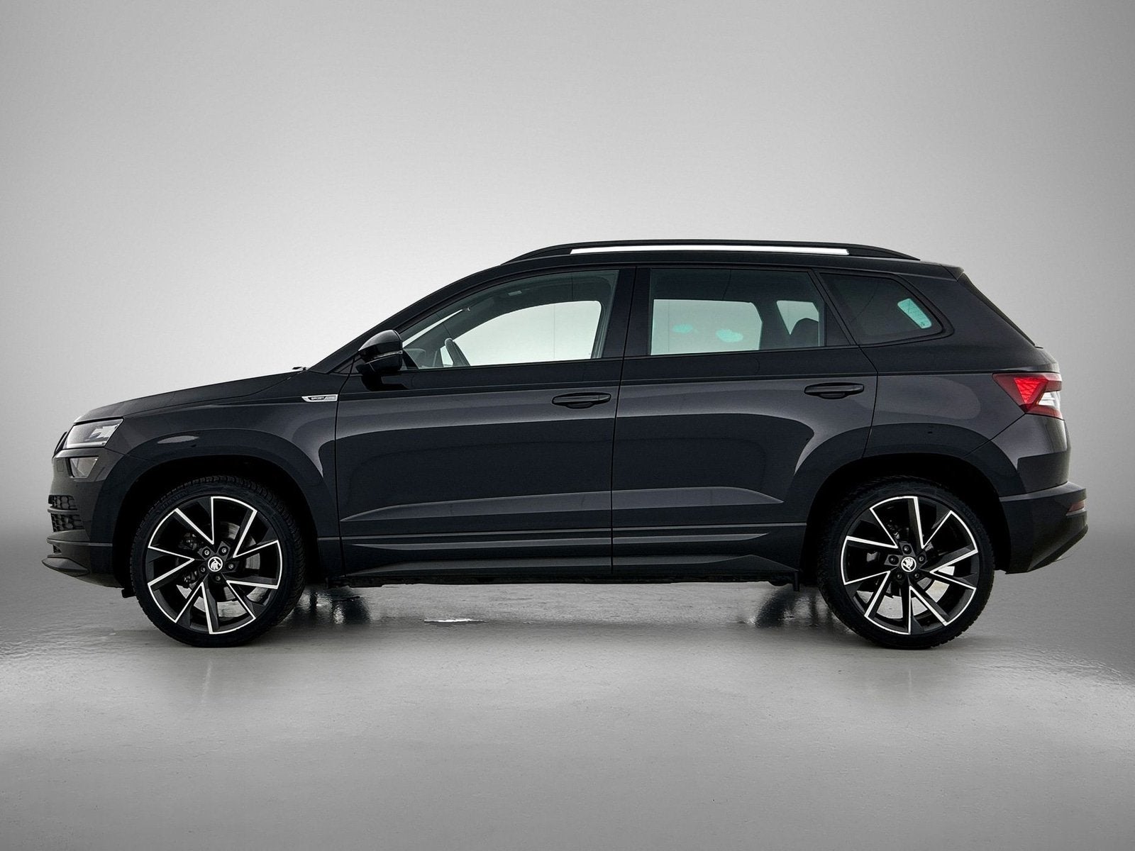 Skoda Karoq 1.5 TSI ACT Sportline Business | Trekhaak | Navi, Automaat, Stof, 4 cilinders, 150 pk