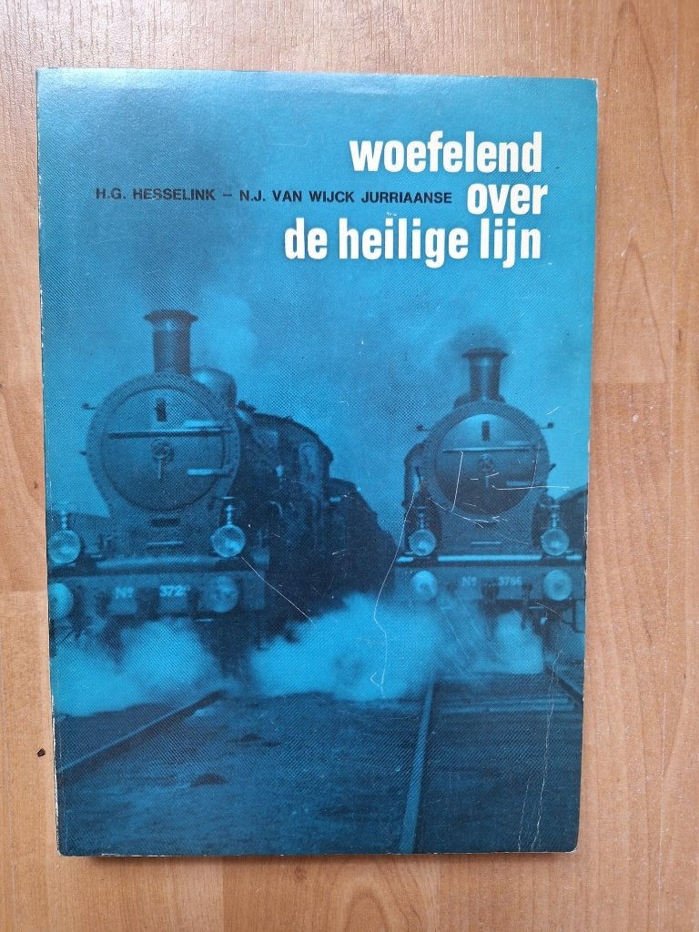 boek woefelend over de heilige lijn, Verzamelen, Ophalen of Verzenden, Zo goed als nieuw, Trein, Boek of Tijdschrift