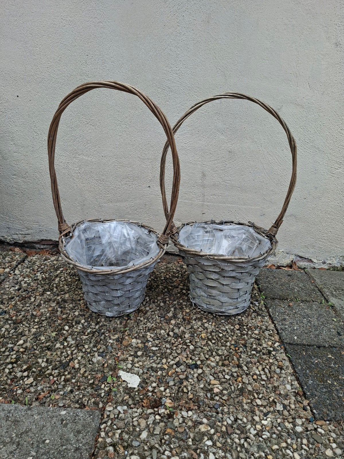 Set van 2 rieten manden met hengsel, Tuin en Terras, Bloembakken en Plantenbakken, Ophalen, Overige materialen, Gebruikt, Minder dan 30 cm