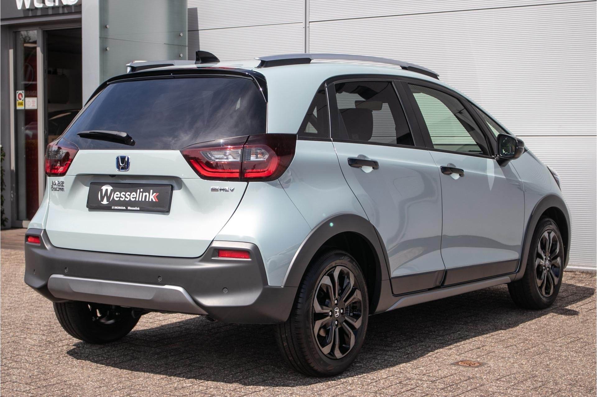 Honda Jazz 1.5 e:HEV Advance Crosstar - Cons.prijs rijklr |, Auto's, 1498 cc, Zwart, 4 cilinders, Blauw