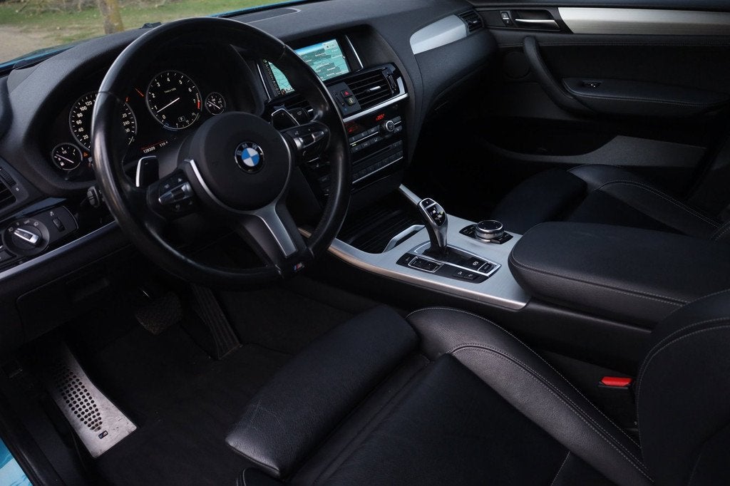 BMW X4 M40i Centennial High Executive Aut. | Dealeronderhoud, Auto's, BMW, Automaat, Gebruikt, 2000 kg, Blauw