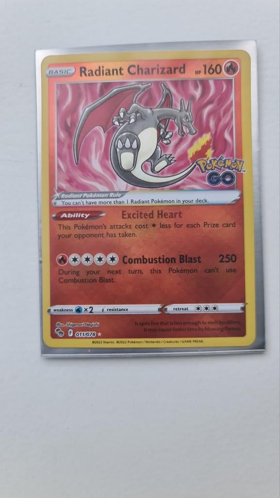 Radiant Charizard Pokémon Go Engels (011/078), Hobby en Vrije tijd, Verzamelkaartspellen | Pokémon, Ophalen of Verzenden, Zo goed als nieuw