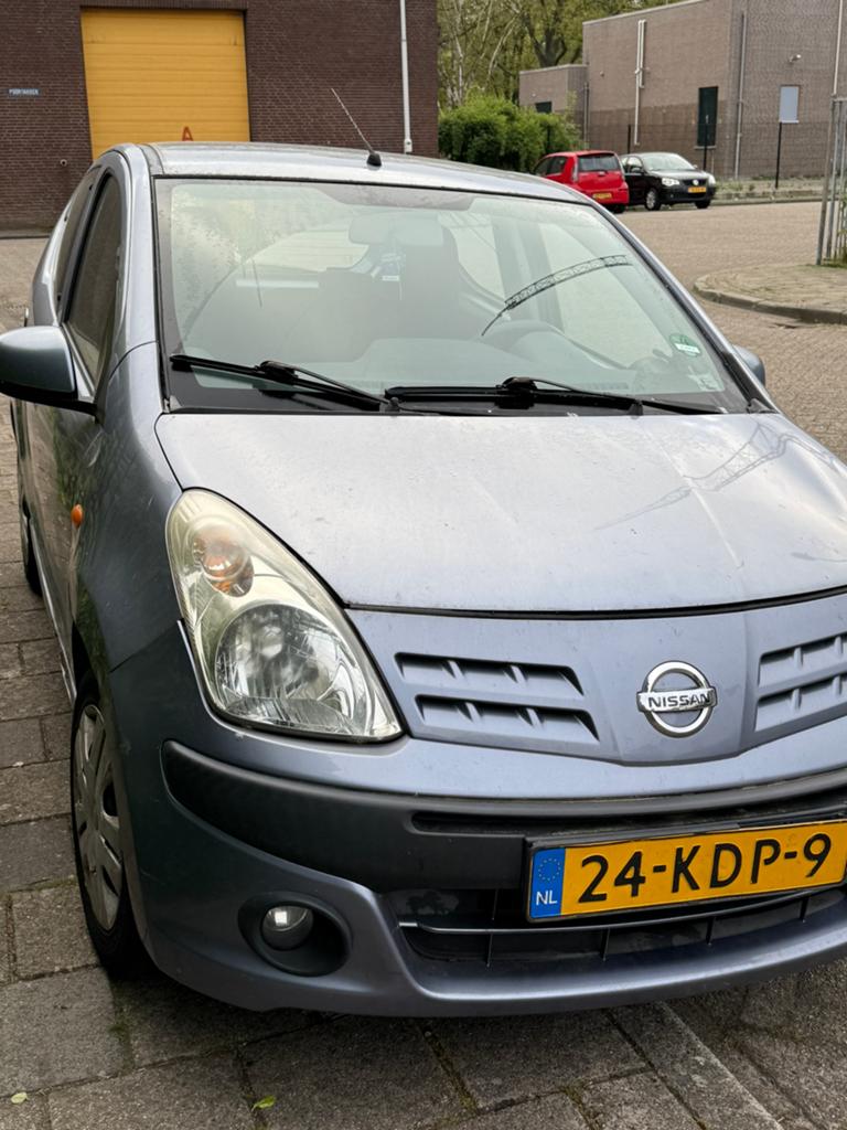Nissan Pixo 1.0 50KW 5D 2009 Grijs, Auto's, Nissan, Voorwielaandrijving, 200 kg, 4 stoelen, Origineel Nederlands