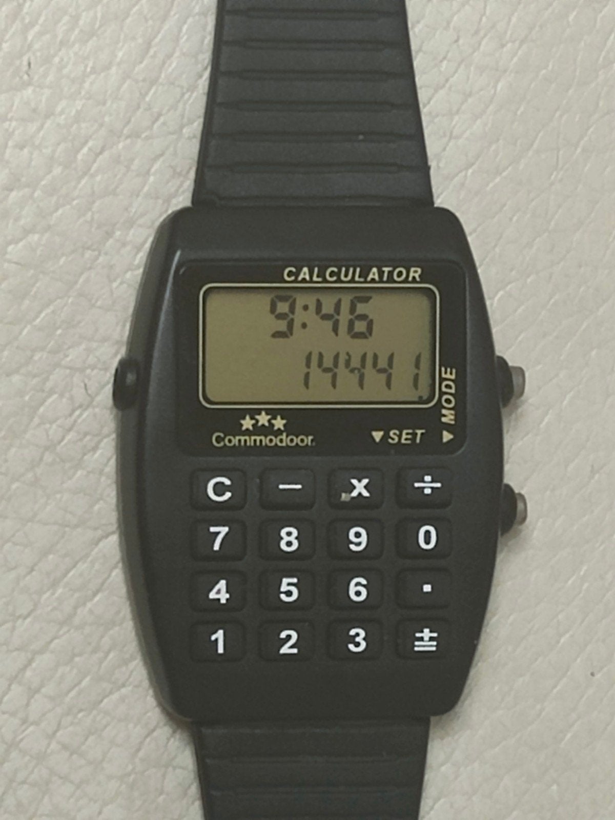 Vintage Commodoor Calculator Horloge perfect werkend., Overige merken, Staal, Met bandje, Polshorloge