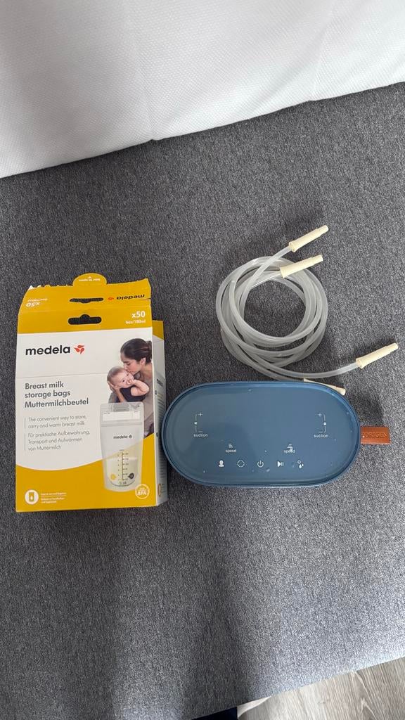 Horigen Elody borstkolf met Medela accessoires, Ophalen of Verzenden, Zo goed als nieuw, Borstkolf