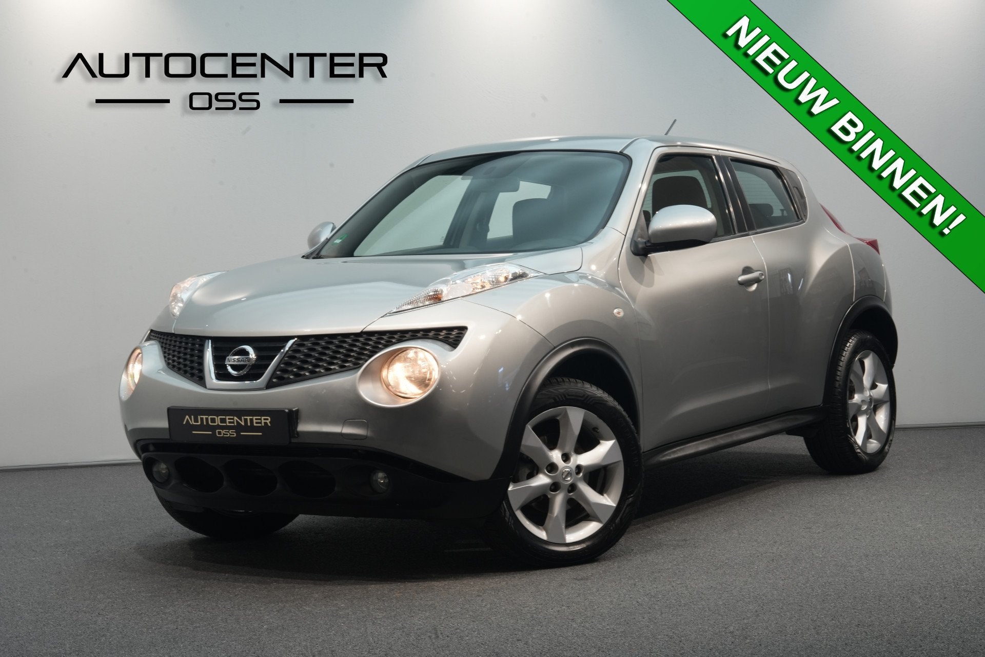 Nissan Juke 1.6 Acenta ✅ NAVI ✅ CAMERA ✅ CRUISE ✅ AU, Auto's, Stof, Zwart, 4 cilinders, 49 €/maand