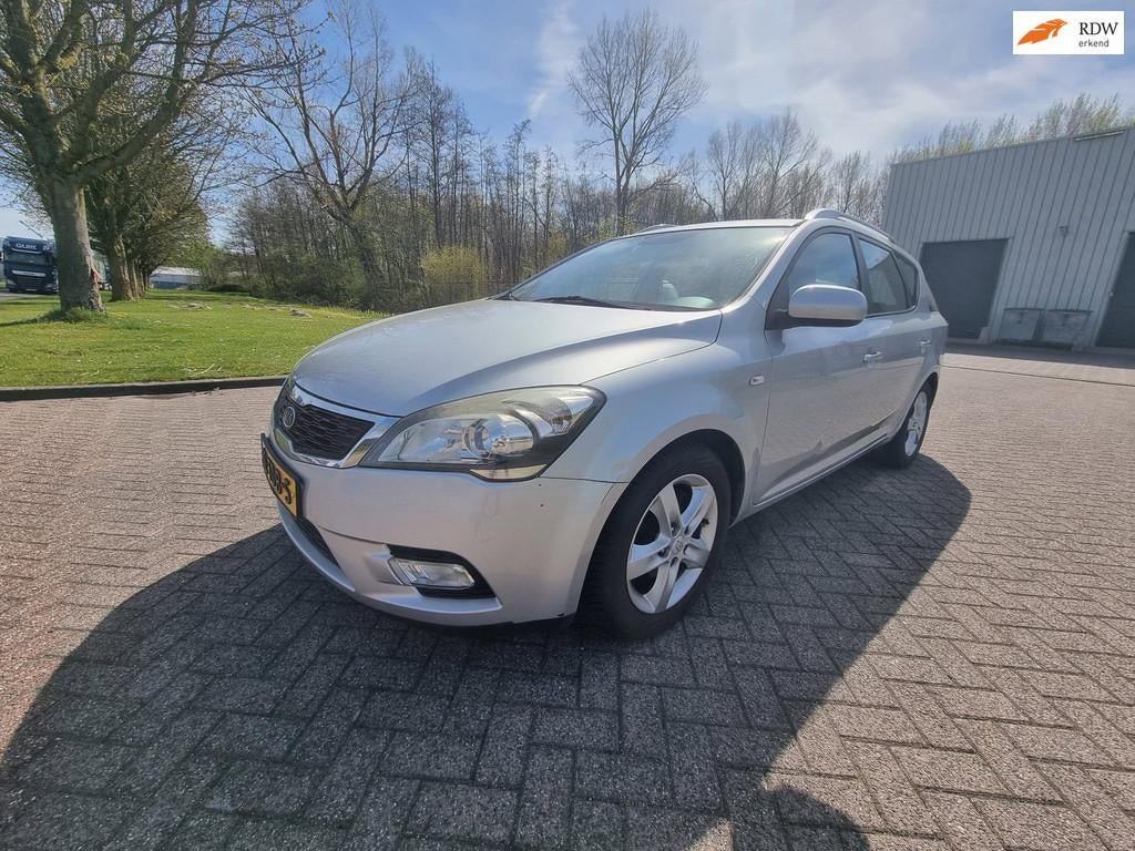 Kia Cee'd Sporty Wagon 1.4 CVVT Navigator Plus Pack NAVI CRU, Auto's, Kia, Voorwielaandrijving, Euro 5, Stof, Gebruikt