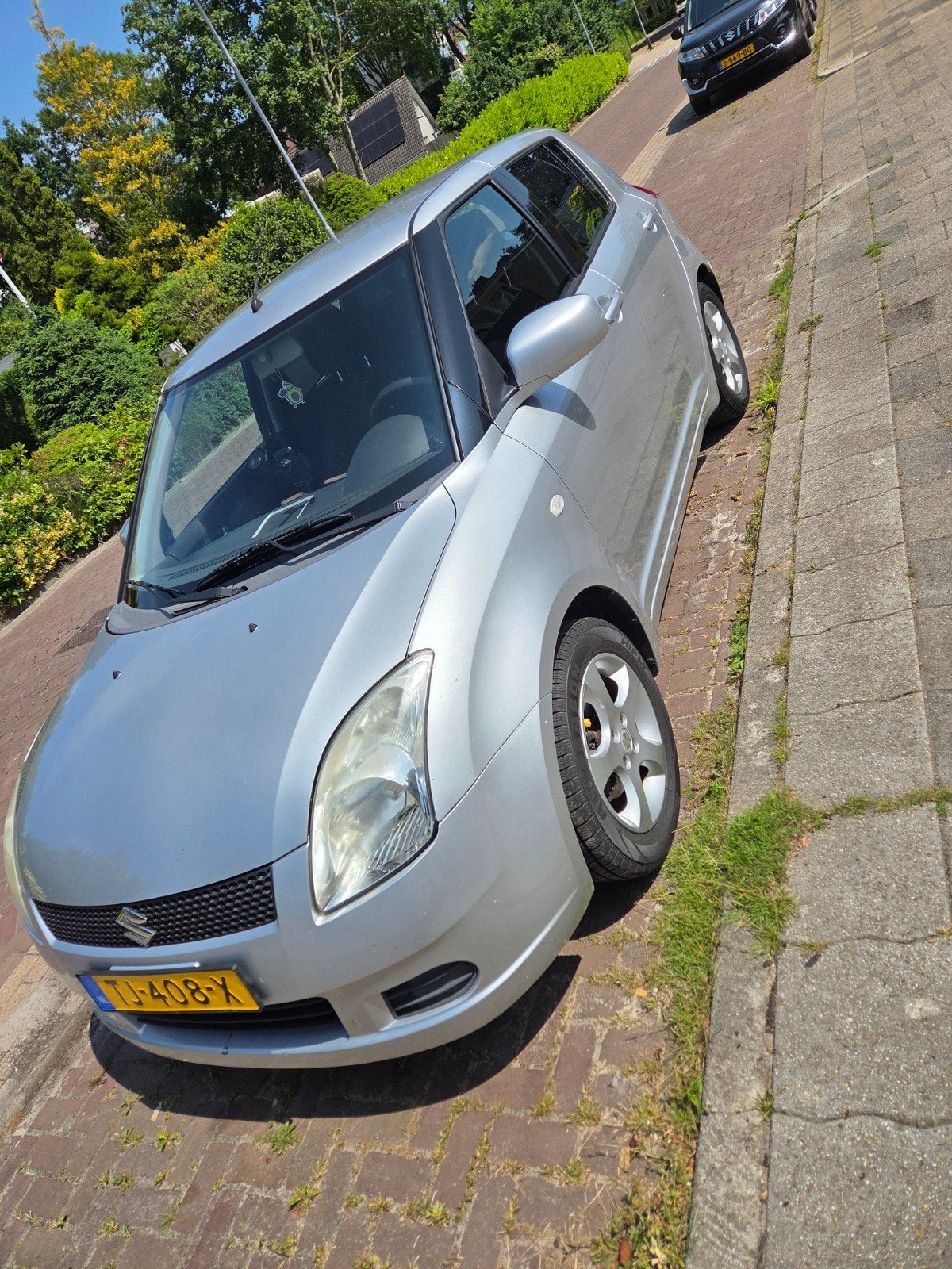 Suzuki Swift 1.3 5D 2006 Grijs, Auto's, Suzuki, Voorwielaandrijving, Stof, 40 €/maand, Zwart