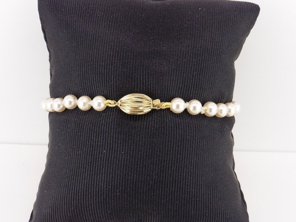 Parel armband met gouden slot                            D53, Overige materialen, Gebruikt, Overige kleuren, .