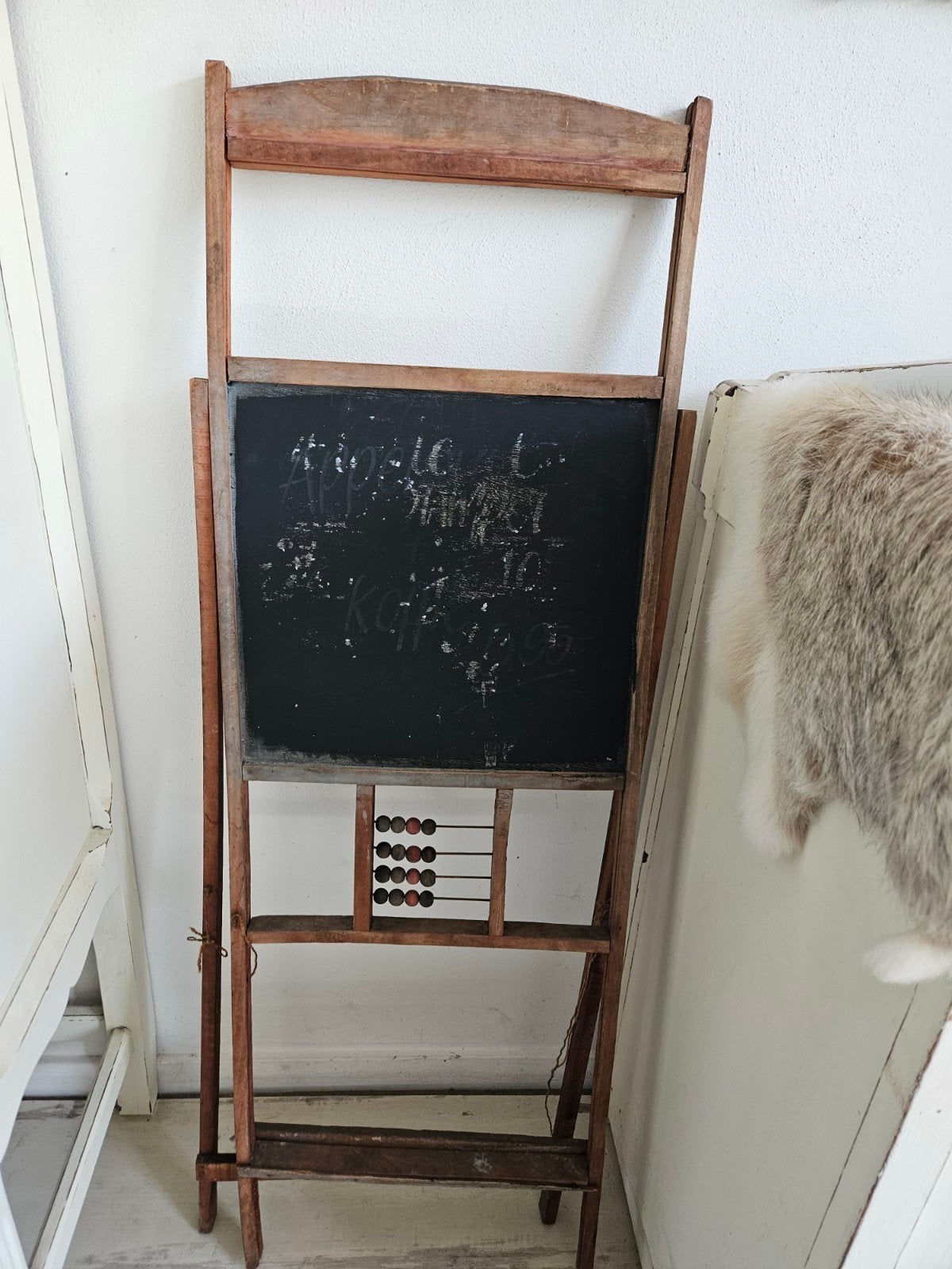 Oud schoolbordje, Ophalen