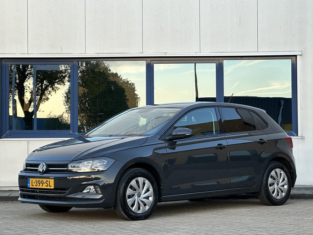 Volkswagen Polo 1.0 TSI Comfortline l Praktisch nieuw l Adap, Auto's, Stof, Gebruikt, 95 pk, 1096 kg