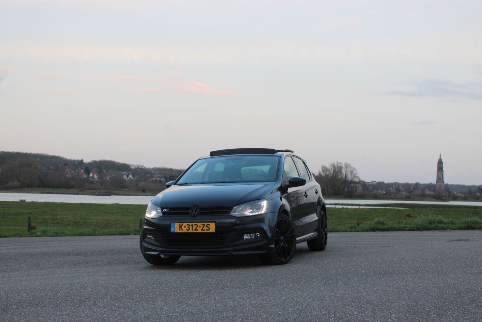 Volkswagen Polo 1.2 TSI 77KW DSG 2011 Zwart, Auto's, Volkswagen, 40 €/maand, Zwart, 4 cilinders, Zwart