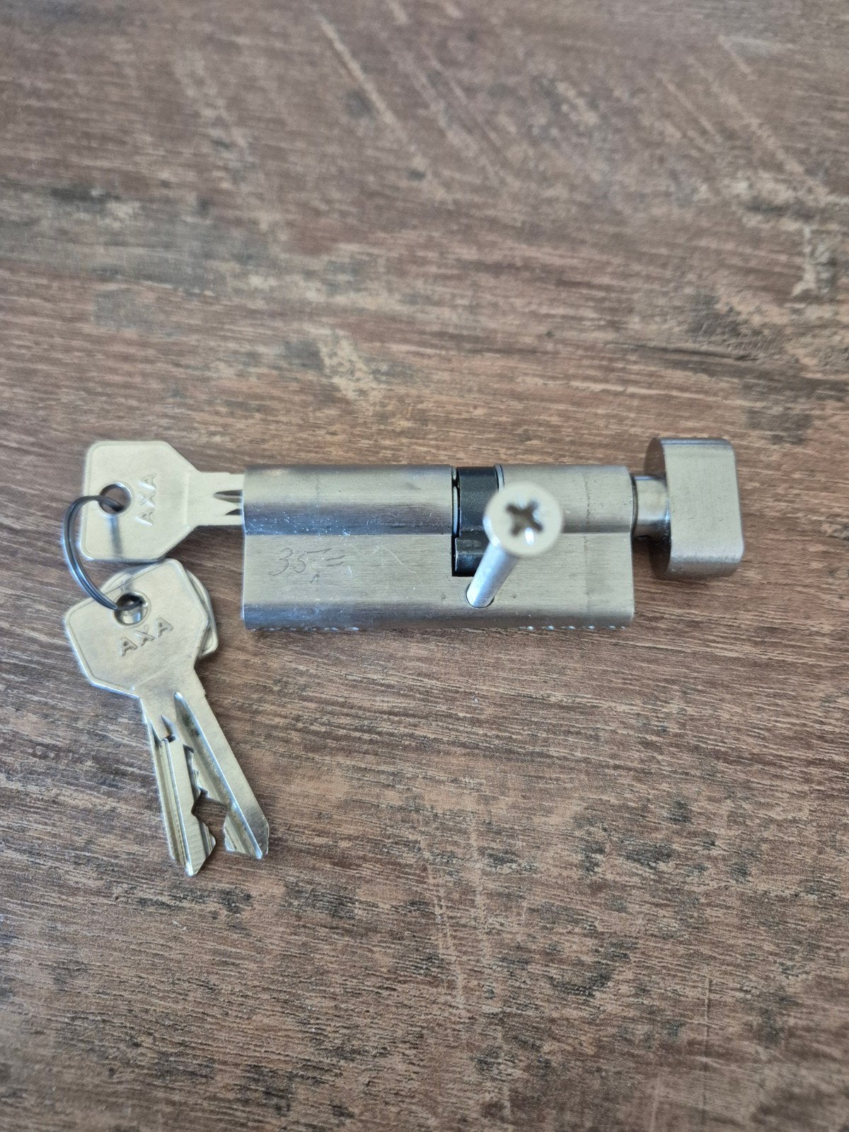 Cilinder 30/45 knop axa met 3 sleutels, Doe-het-zelf en Verbouw, Hang- en Sluitwerk, Ophalen of Verzenden, Zo goed als nieuw, Rvs