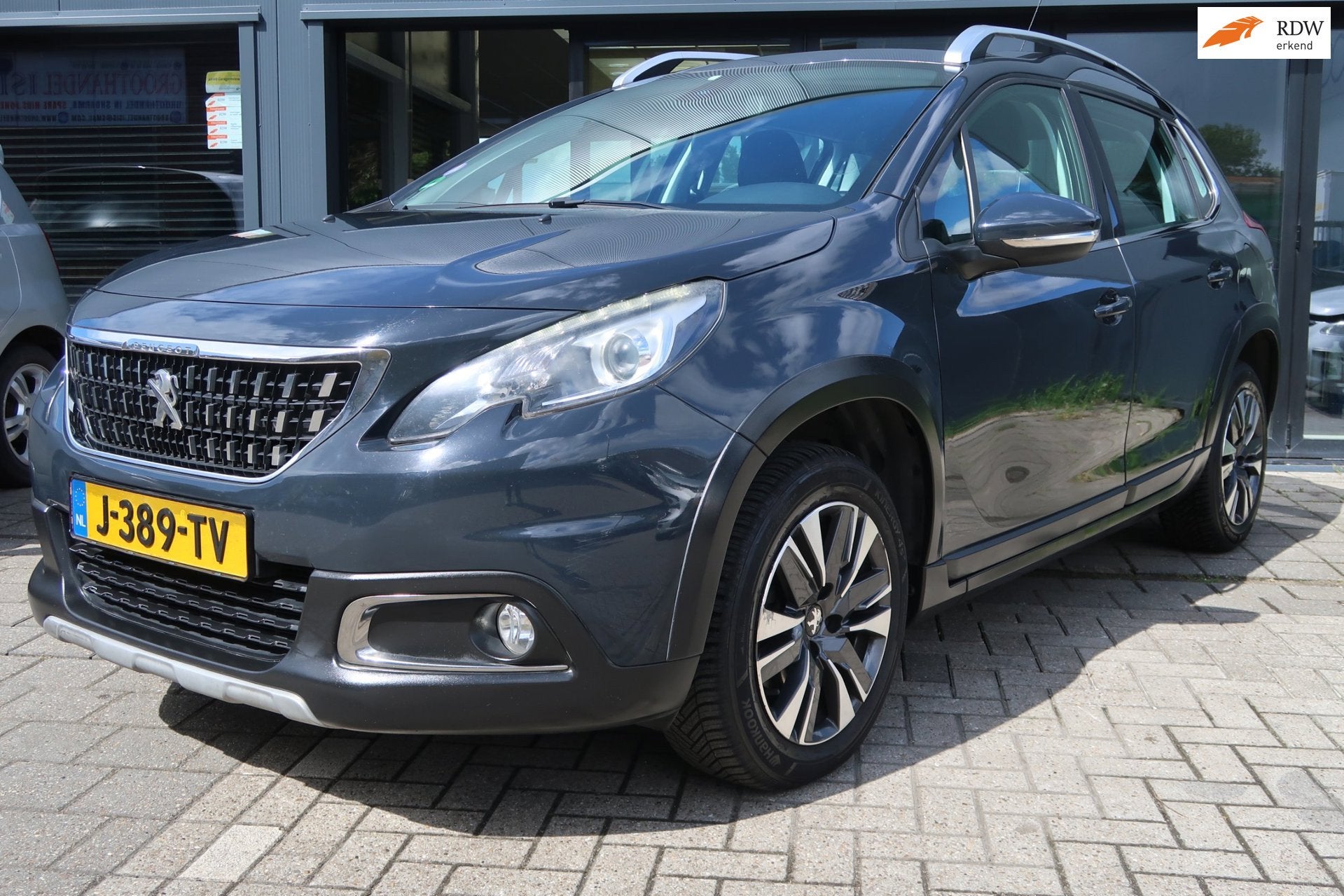 Peugeot 2008 1.2 PureTech Allure *Rijklaarprijs *Dealerondeh, Voorwielaandrijving, Leder en Stof, Bedrijf, Handgeschakeld