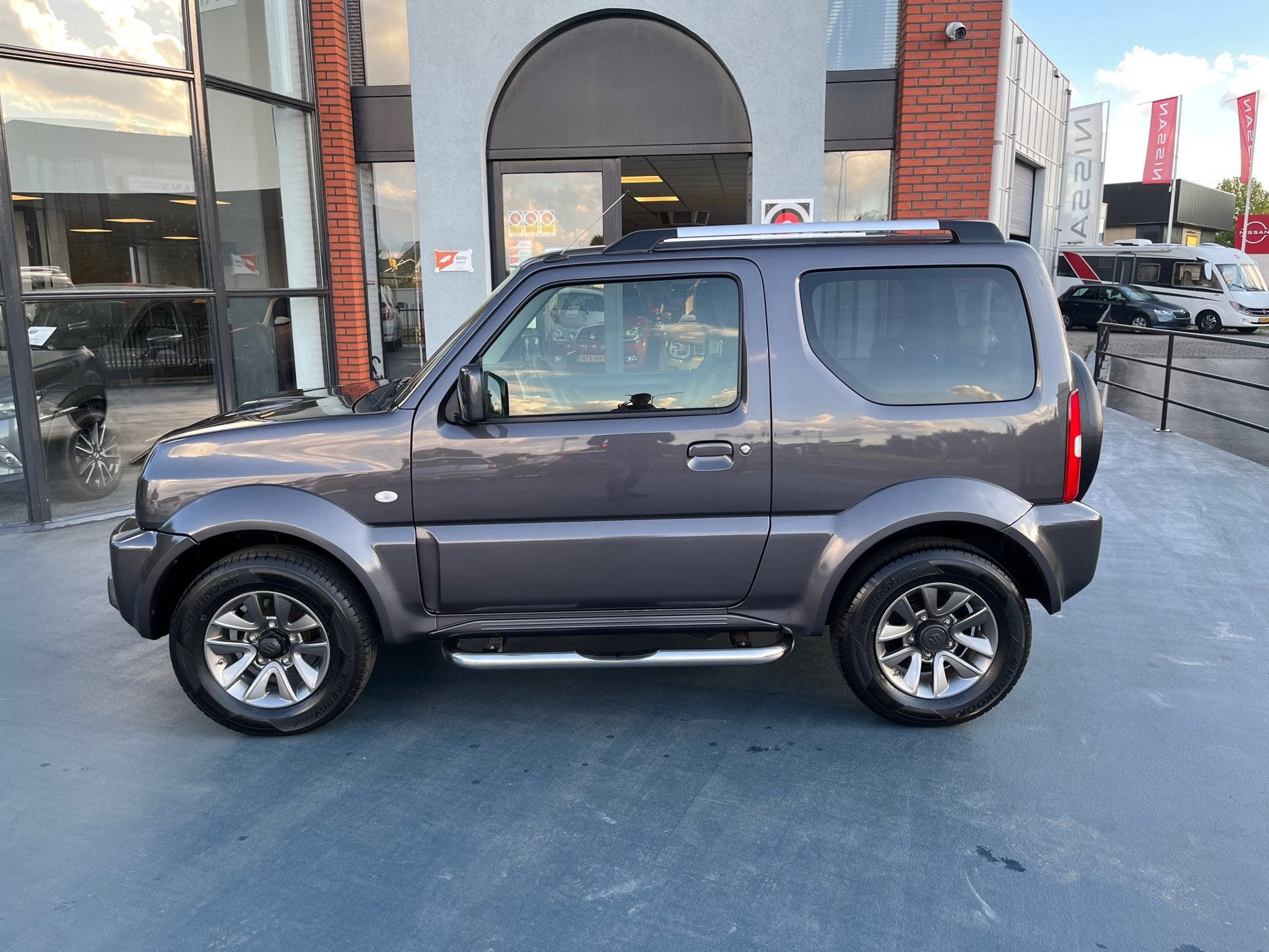 Suzuki JIMNY 1.3 Exclusive 4X4 LEDER STOELVERWARMING AIRCO, Stoelverwarming, Gebruikt, Euro 6, 4 stoelen