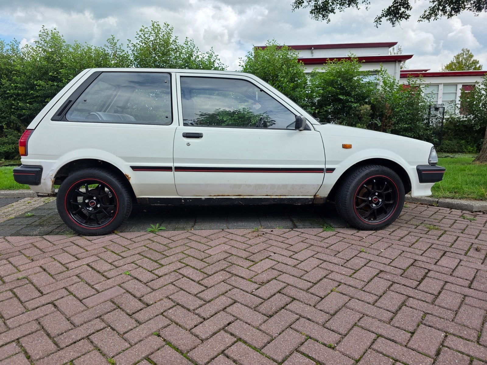 Toyota Starlet 1.3 XL 12V AUT 1989 Wit, Stof, Starlet, Wit, Origineel Nederlands