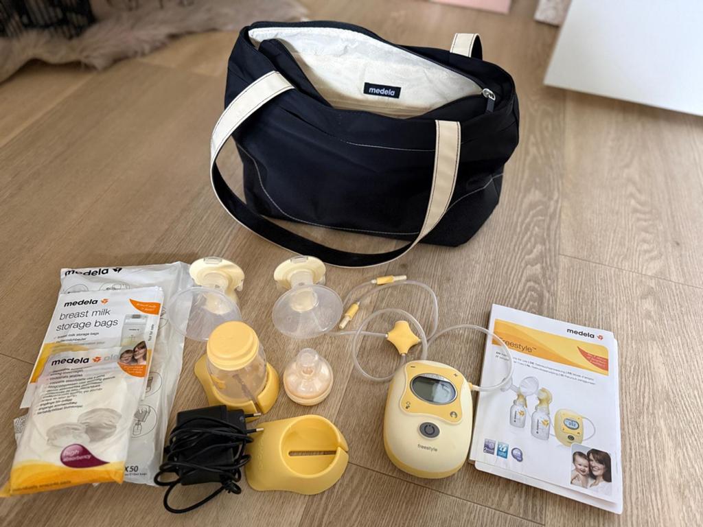 Medela handkolf incl. Tas en bewaarzakjes, Ophalen of Verzenden, Zo goed als nieuw, Borstkolf