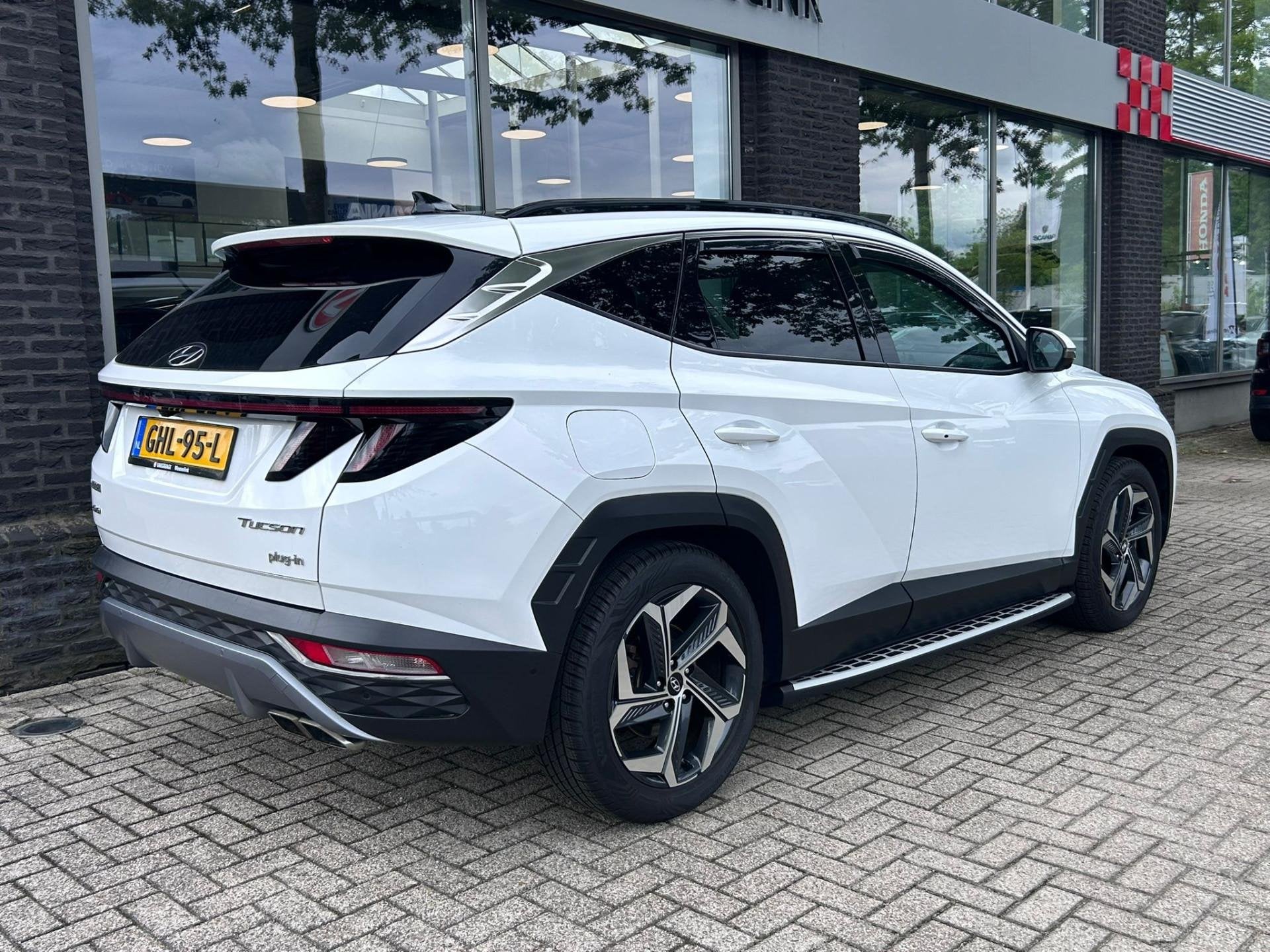 Hyundai Tucson 1.6 T-GDI PHEV Premium Sky 4WD | Panorama | L, Auto's, 1350 kg, Gebruikt, 4 cilinders, Wit