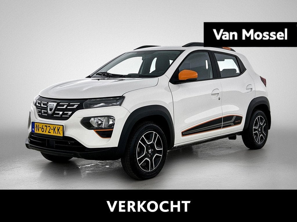 Dacia Spring Comfort Plus (Orange Pack) 27 kWh | Achteruitri, Auto's, Dacia, 12 maanden, Gebruikt, Leder en Stof, Wit