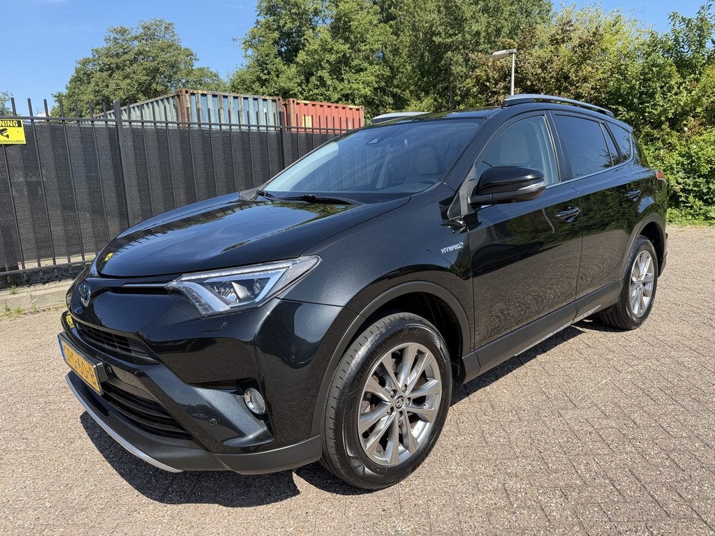 Toyota RAV4 2.5 Hybrid AWD Executive Cam/Clima/Leer/ACC/Stoe, Auto's, Automaat, Gebruikt, 1650 kg, Zwart