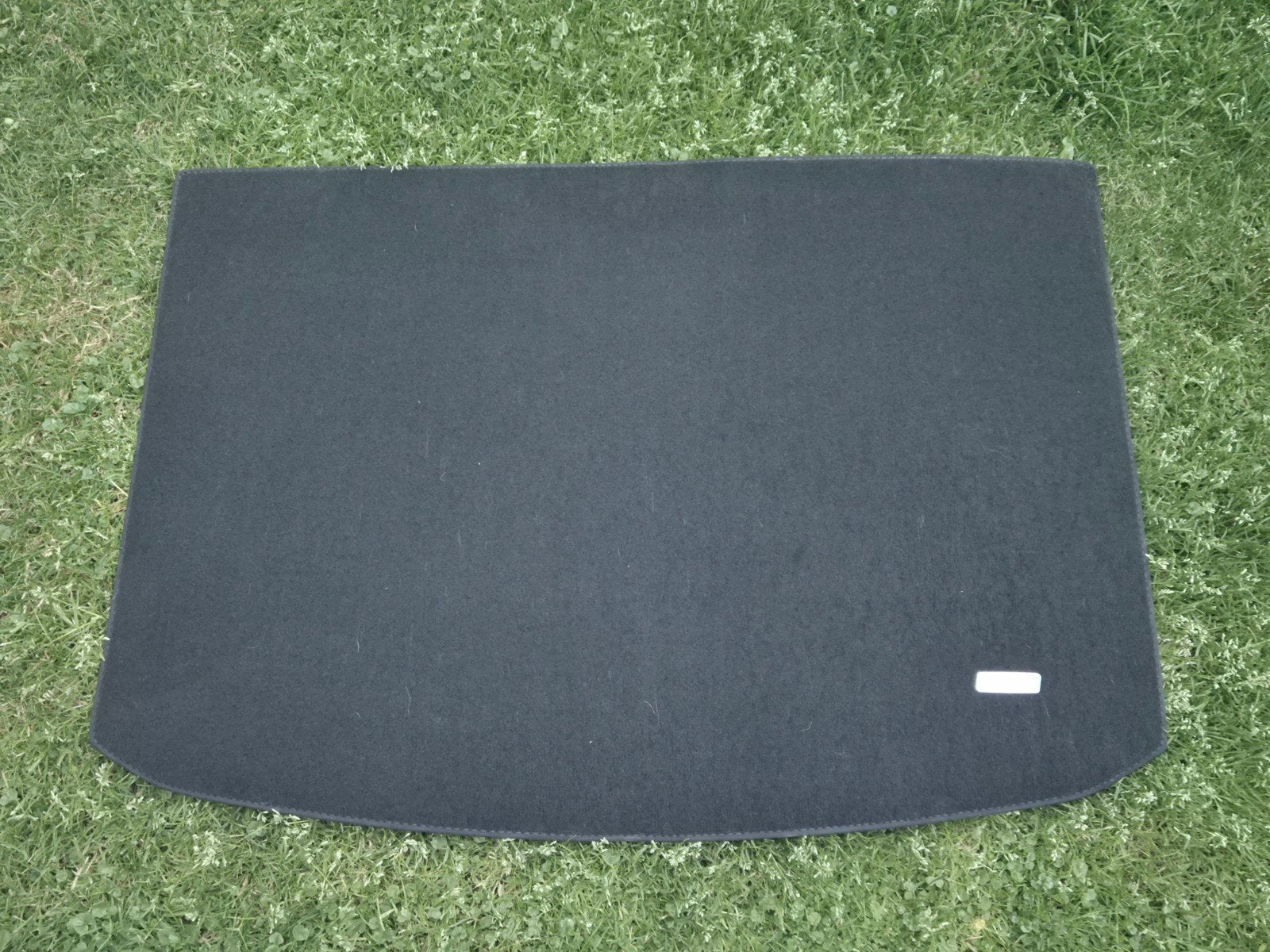 Volvo V40 omkeerbare kofferbakmat, Ophalen