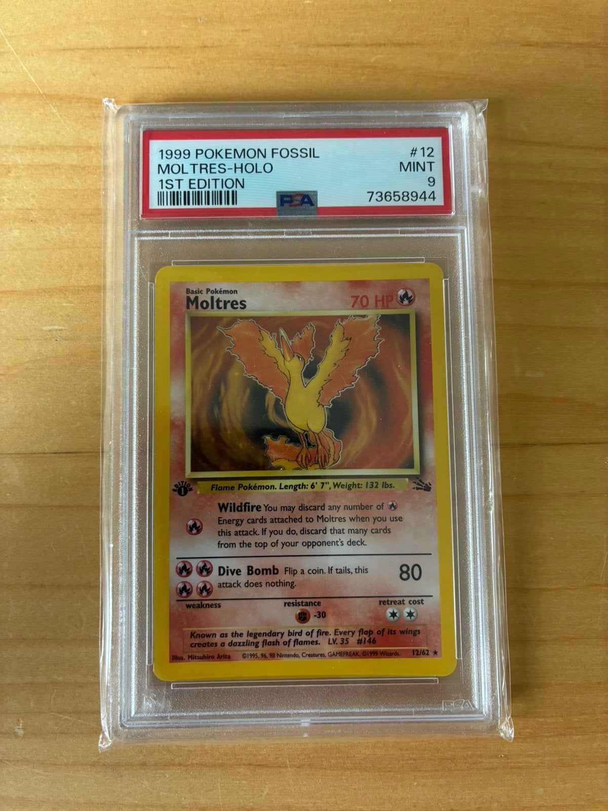 12/62 Moltres - 1st. Edition - HOLO - PSA 9, Ophalen of Verzenden