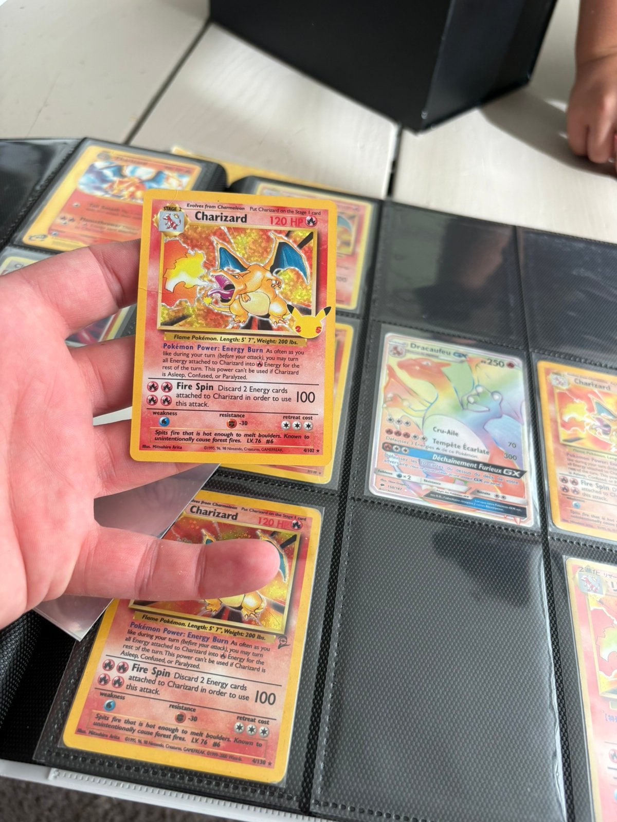 Charizard celebration, Ophalen of Verzenden, Zo goed als nieuw, Meerdere kaarten, Foil