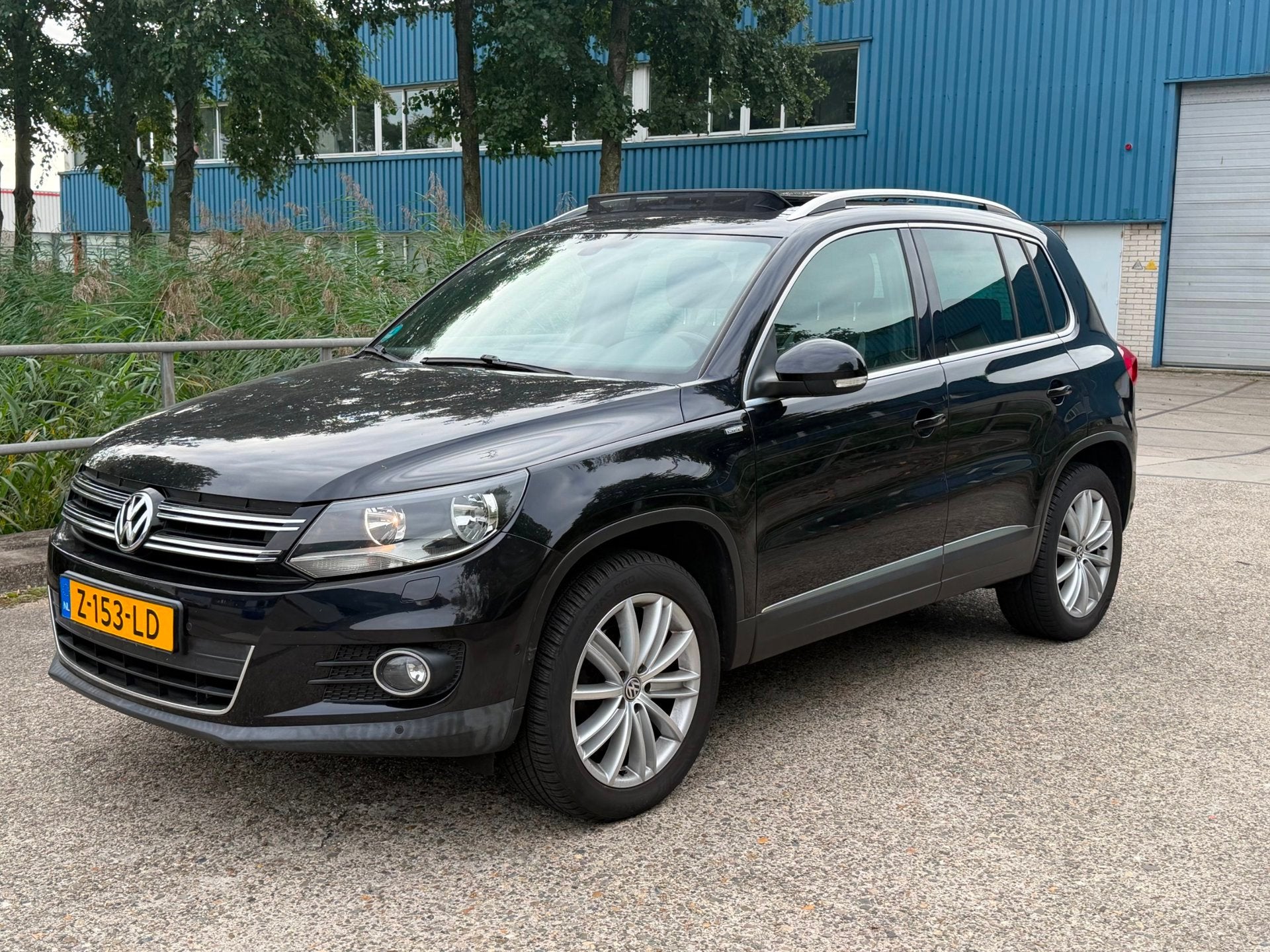 Volkswagen Tiguan 1.4 TSI Comfort&Design Facelift! PANO! NAV, Euro 5, 15 km/l, 4 cilinders, Zwart