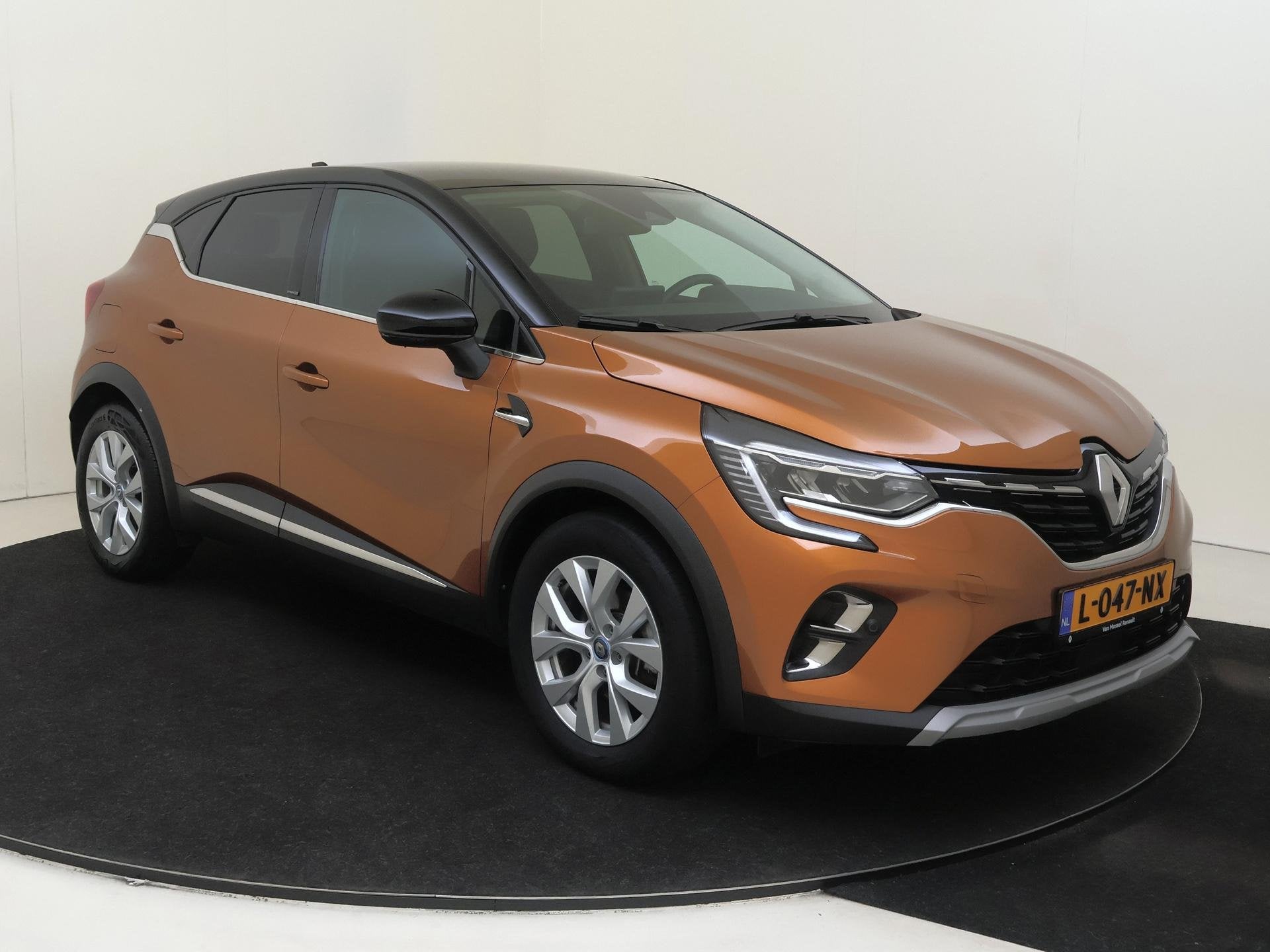 Renault Captur 1.6 E-Tech Plug-in Hybrid 160 Intens Groot sc, Auto's, Renault, Stof, Gebruikt, Hybride Elektrisch/Benzine, 71 km/l