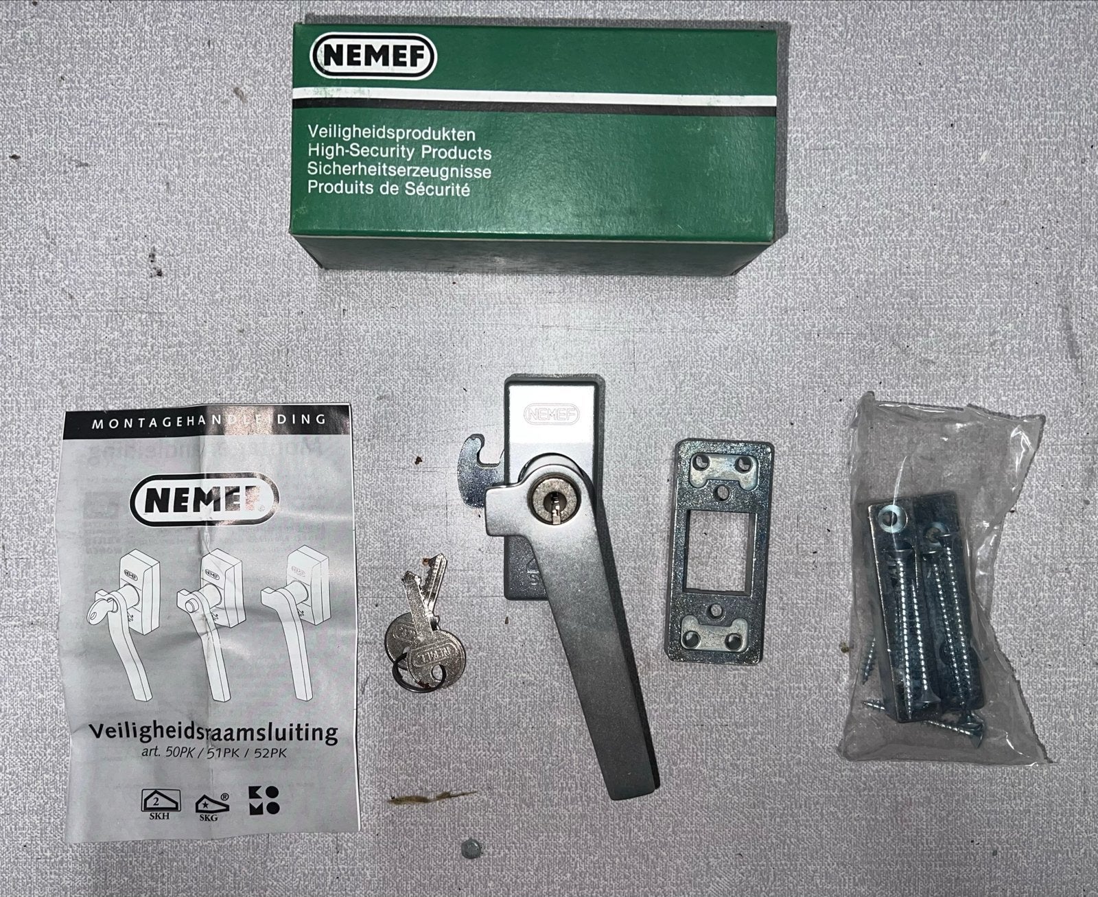 60st op voorraad - NEMEF Raamsluiting 50pk/4 RS rechts, Ophalen of Verzenden, Nieuw, Overige materialen, Slot