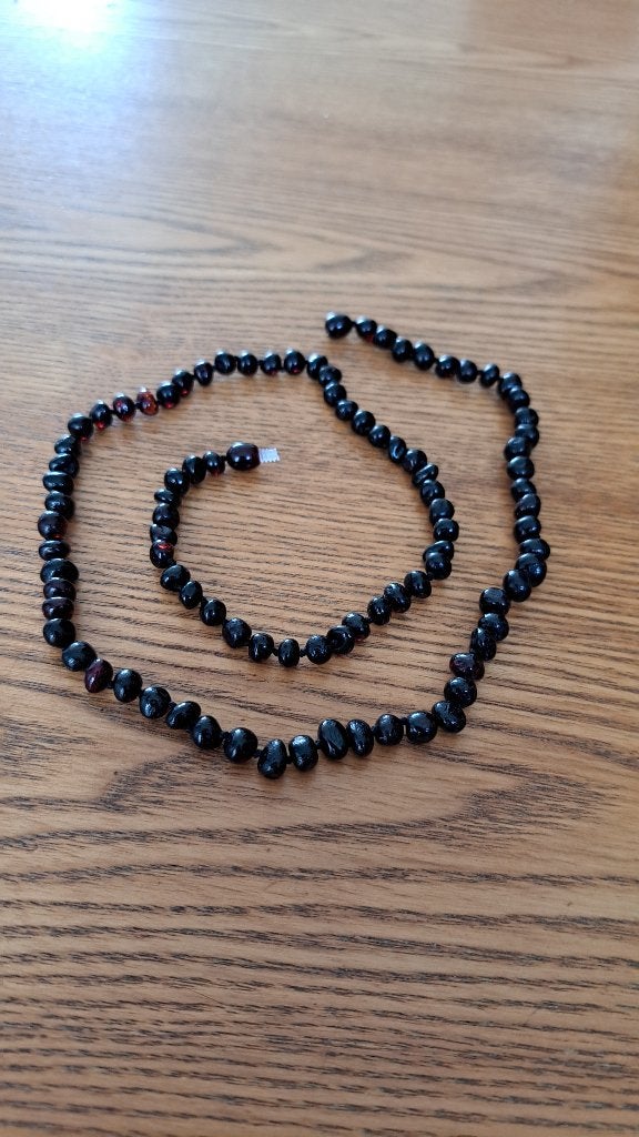 Barnsteen ketting van 60 cm, Ophalen of Verzenden, Zo goed als nieuw, Zwart, Steen of Mineraal