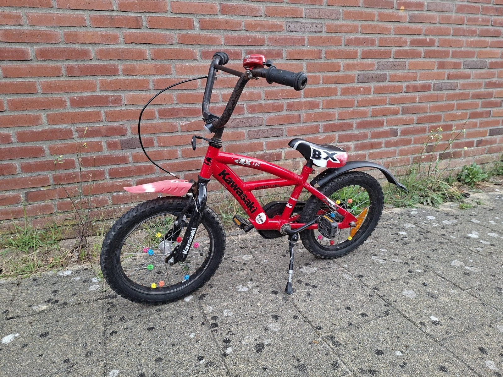 Kawasaki 16 inch kinderfiets - Ideaal voor jonge cross fans!, Fietsen en Brommers, Fietsen | Crossfietsen en BMX, Ophalen, Terugtraprem
