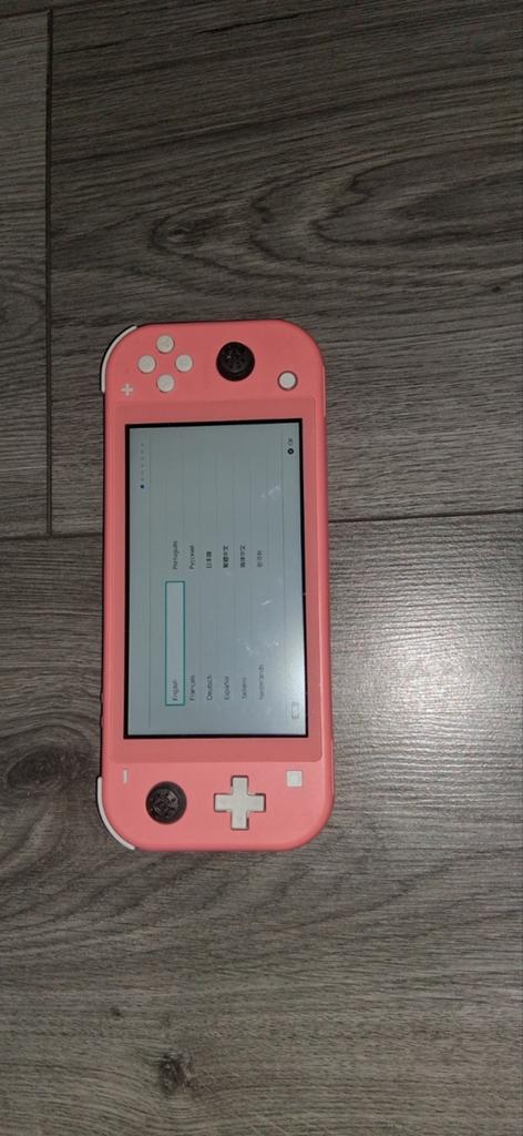 Nintendo Switch Lite Roze - Zo goed als nieuw, Spelcomputers en Games, Spelcomputers | Nintendo Switch Lite, Ophalen, Roze of Coral