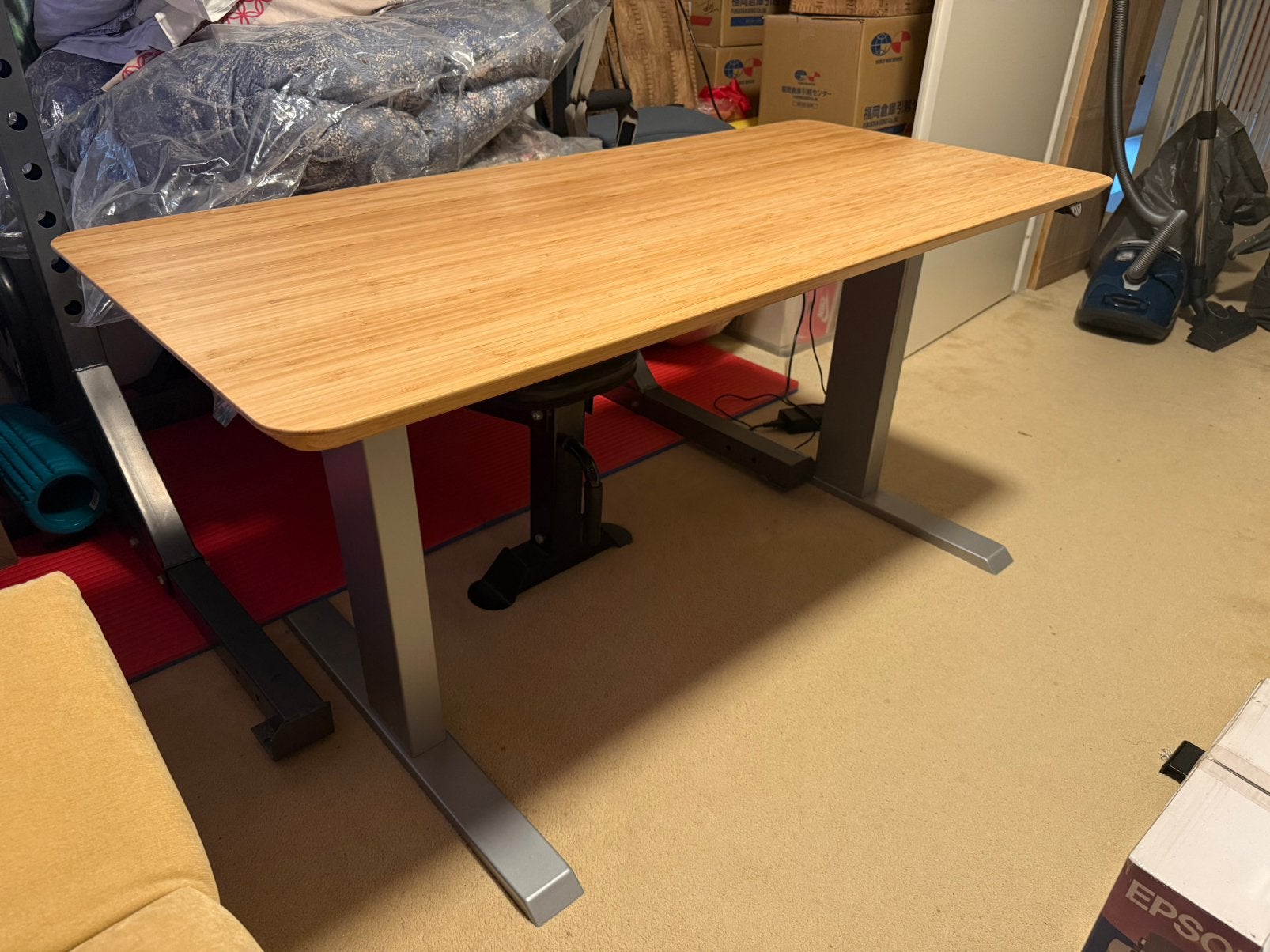 Electrisch verstelbaar bureau, bamboe blad 150x65, Ophalen, Zo goed als nieuw