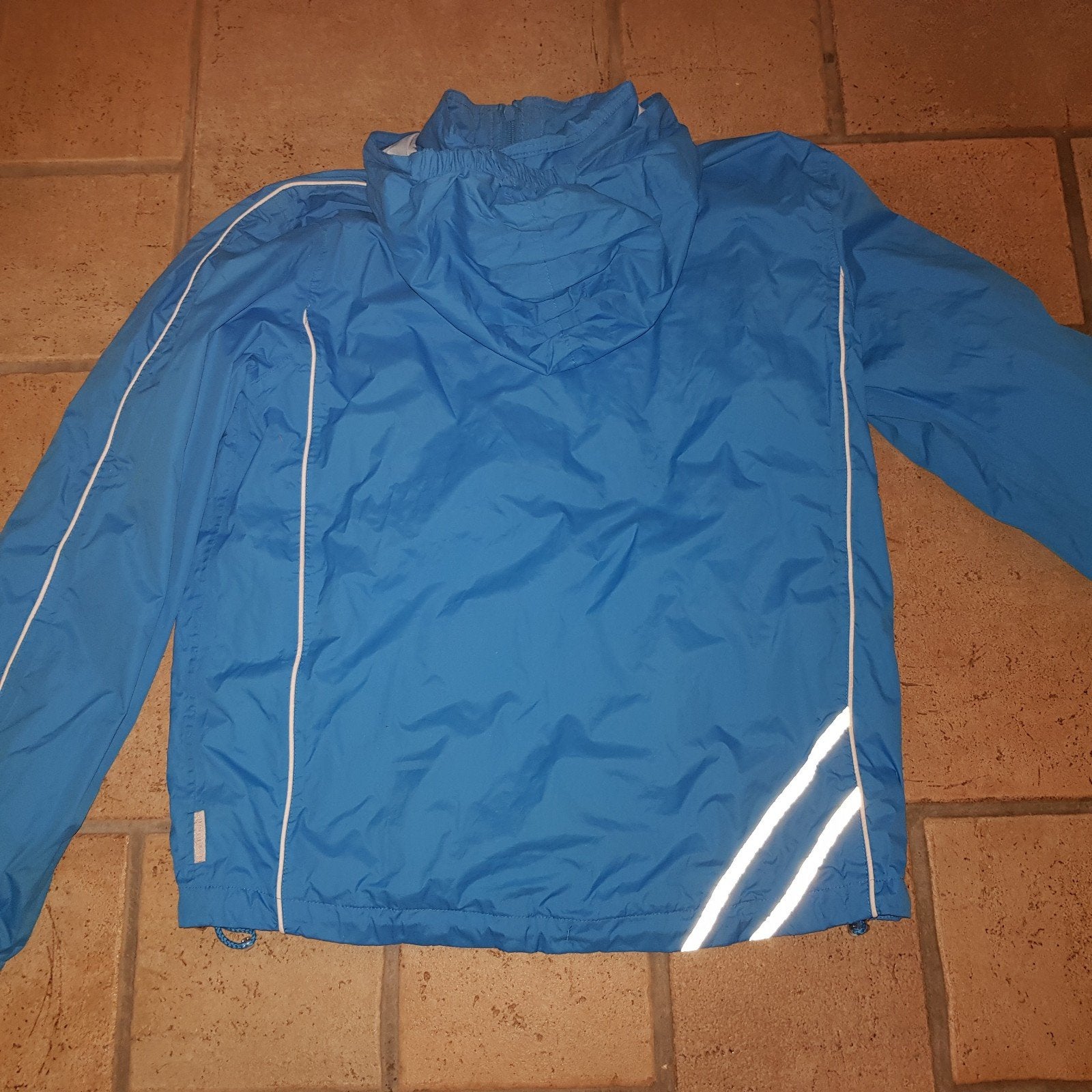 Regenjas 164 Rucanor Sport blauw regenjack jas, Jongen of Meisje, Rucanor, Ophalen of Verzenden, Zo goed als nieuw
