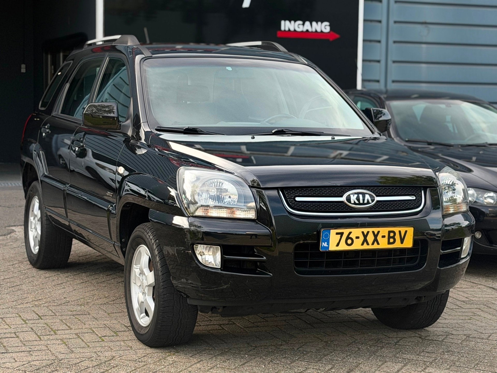 Kia Sportage 2.7 V6 Adventure 4WD AUTOMAAT NAVI/AIRCO/CRUISE, Automaat, Stof, Gebruikt, Zwart
