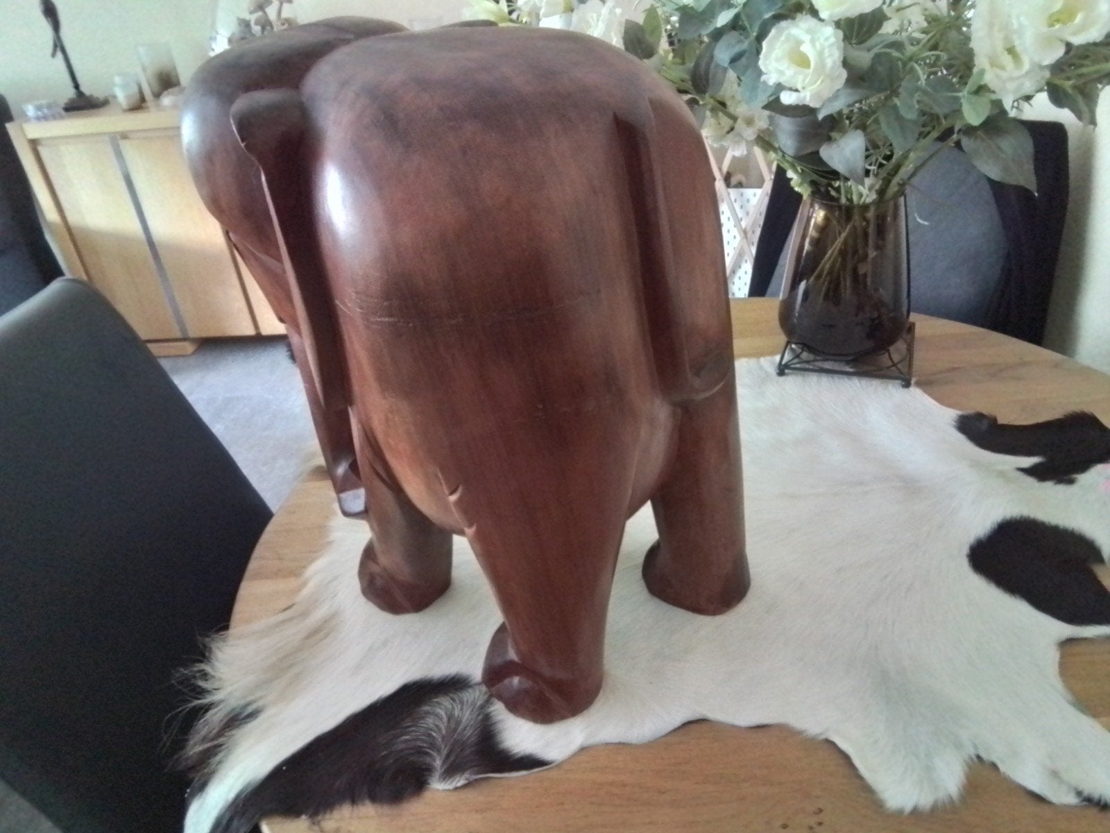 grote olifant van hout, Ophalen