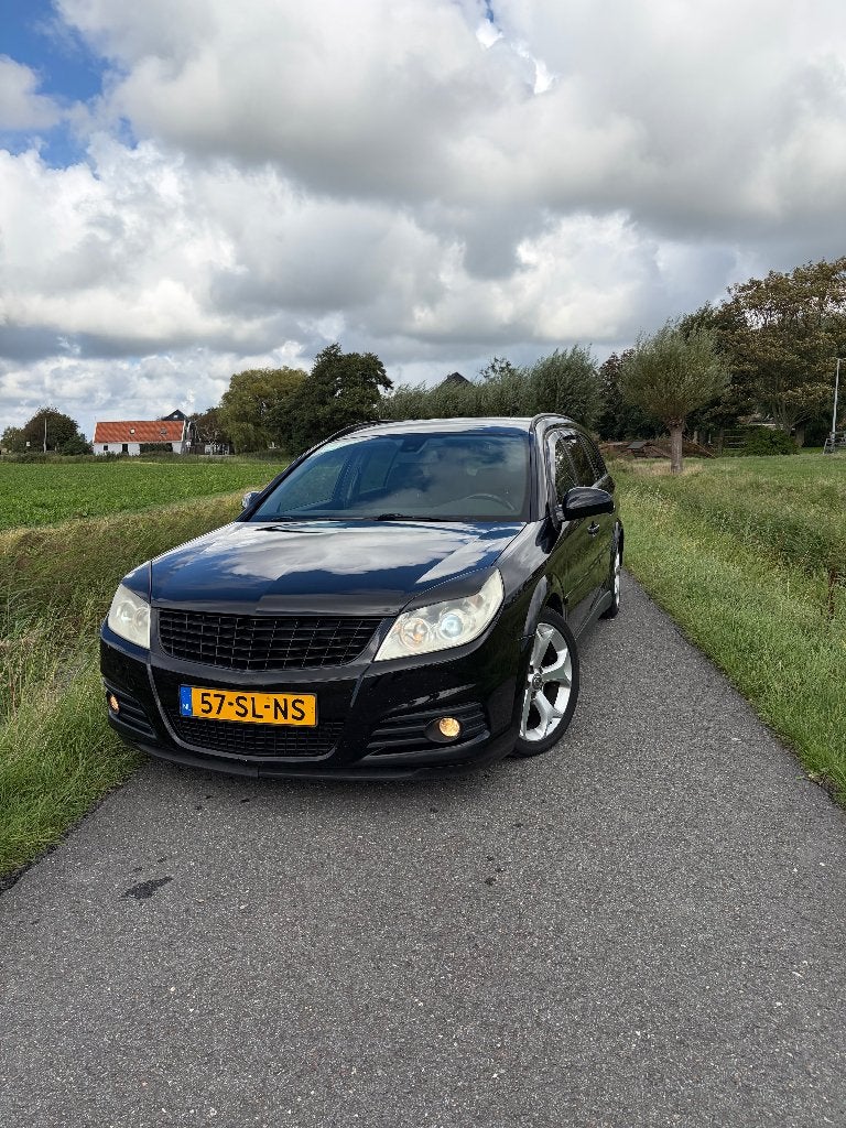 Opel Vectra 2.8 V6 St.wgn. AUT 2006 Zwart, Auto's, 1800 kg, Zwart, Origineel Nederlands, Stationwagon
