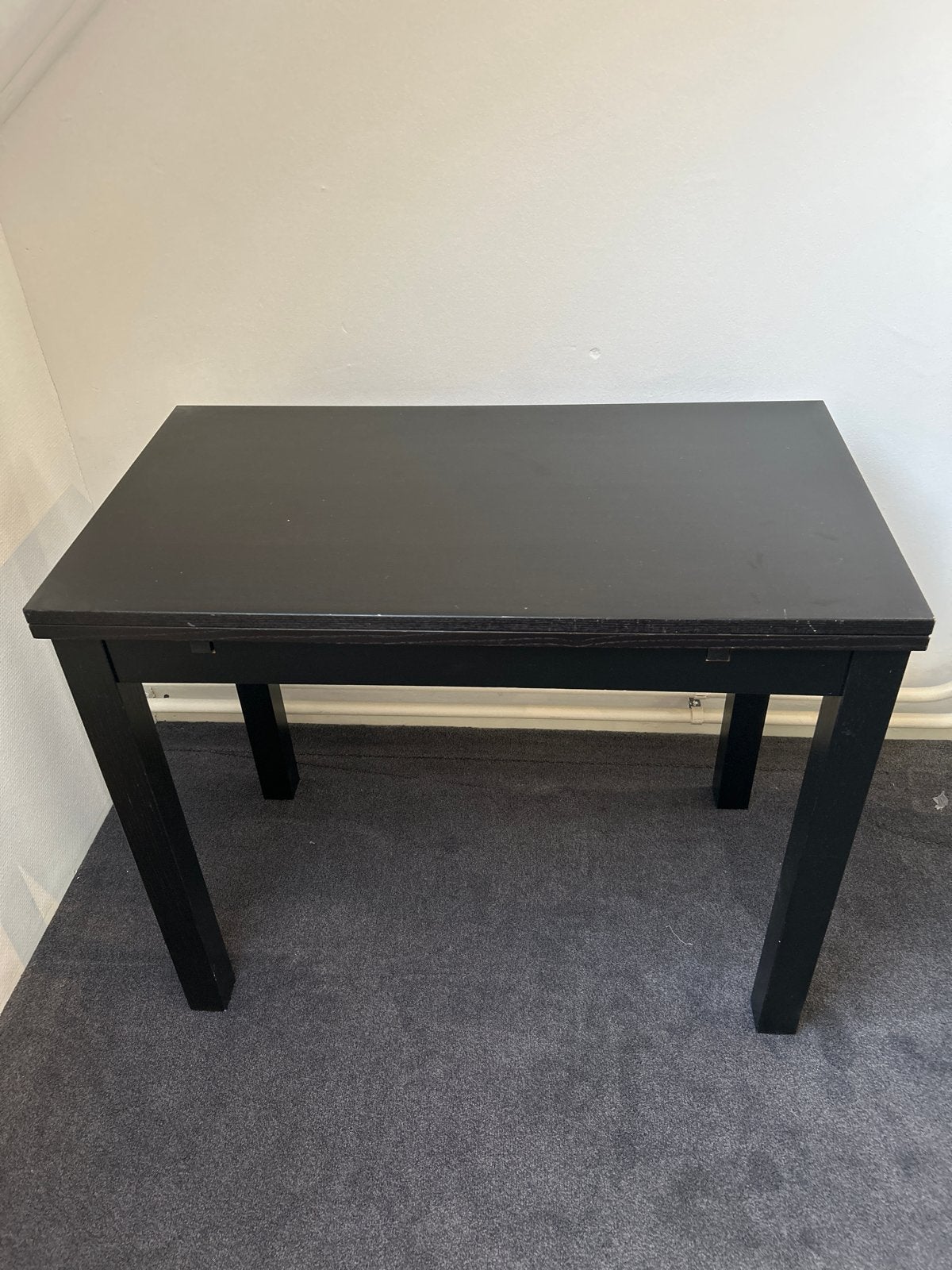 Zwarte uitschuifbare tafel IKEA max. 88,5cm diepte bureau, Ophalen of Verzenden, Gebruikt, Rechthoekig, 50 tot 100 cm