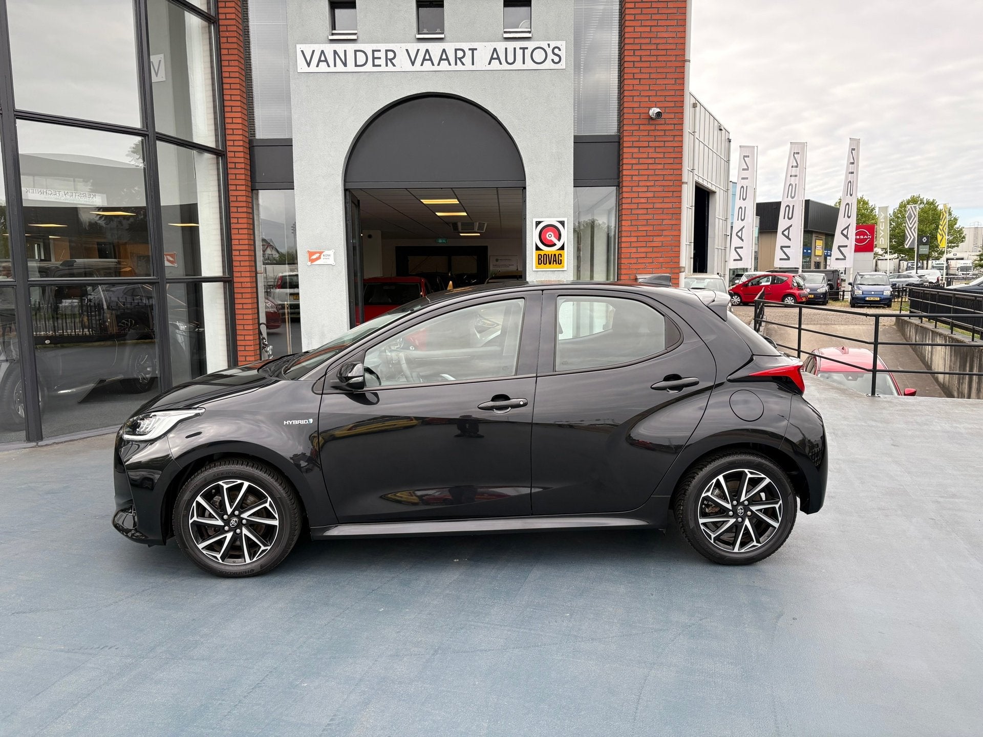 Toyota Yaris 1.5 Hybrid 115 Business, Auto's, Dealer onderhouden, 450 kg, Gebruikt, Euro 6