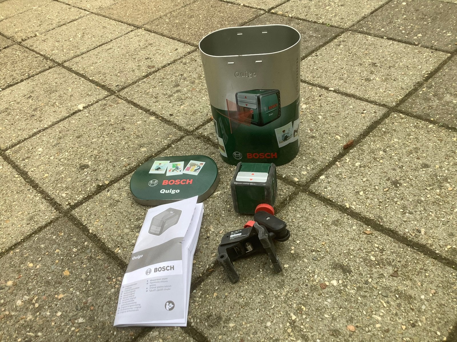 Bosch Quigo kruislijnlaser met houder en handleiding, Ophalen of Verzenden, Zo goed als nieuw