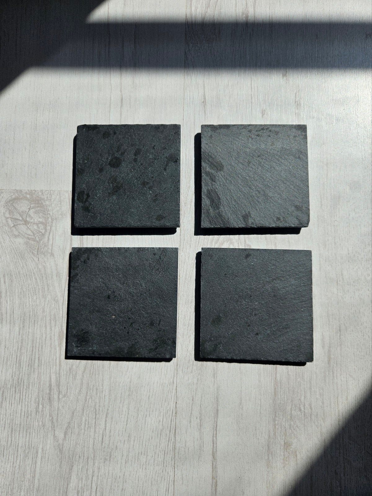 Set van 4 leistenen onderzetters, Ophalen of Verzenden, Zo goed als nieuw, Glas of Kopje