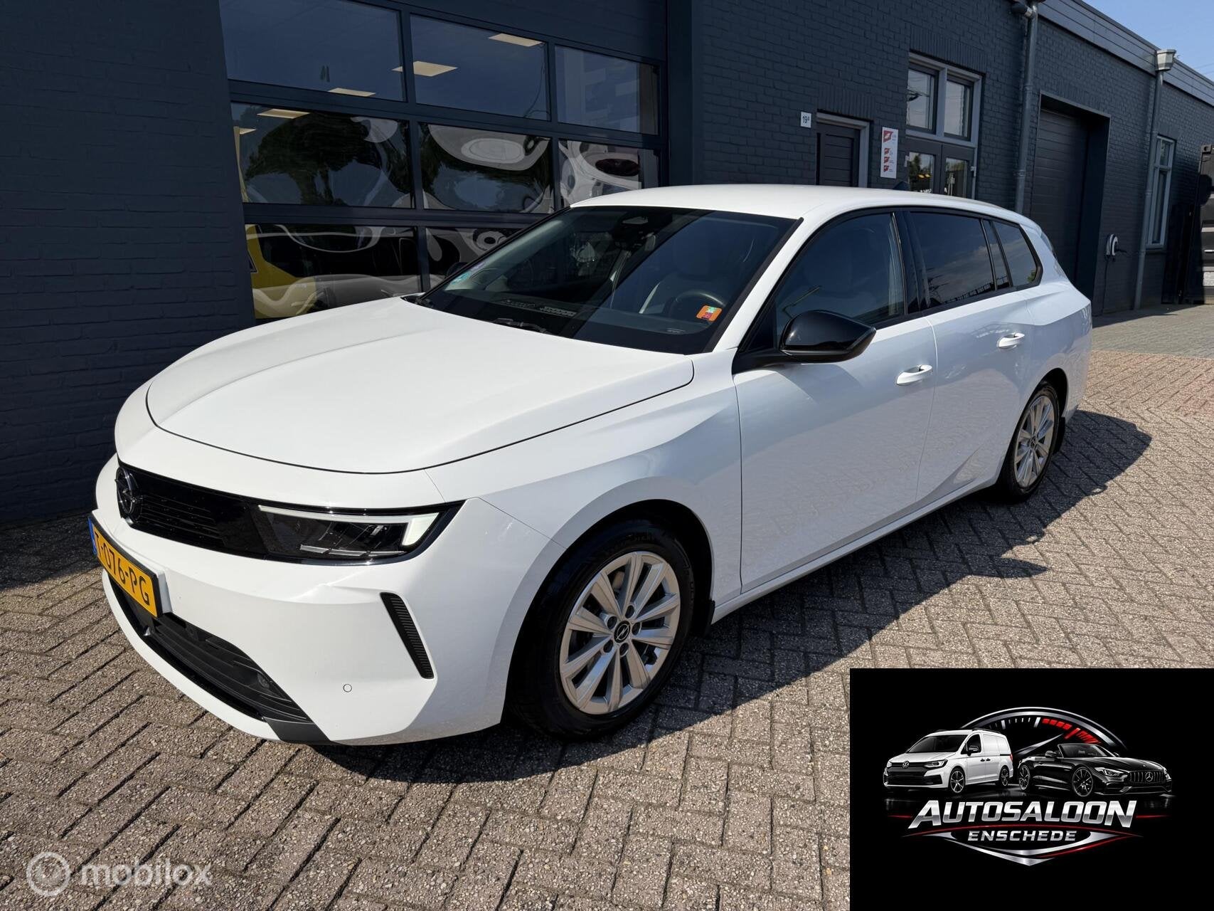 Opel Astra Sports Tourer 1.2 110 PK Airco Navi Camera PDC, Voorwielaandrijving, Stof, Gebruikt, 1199 cc