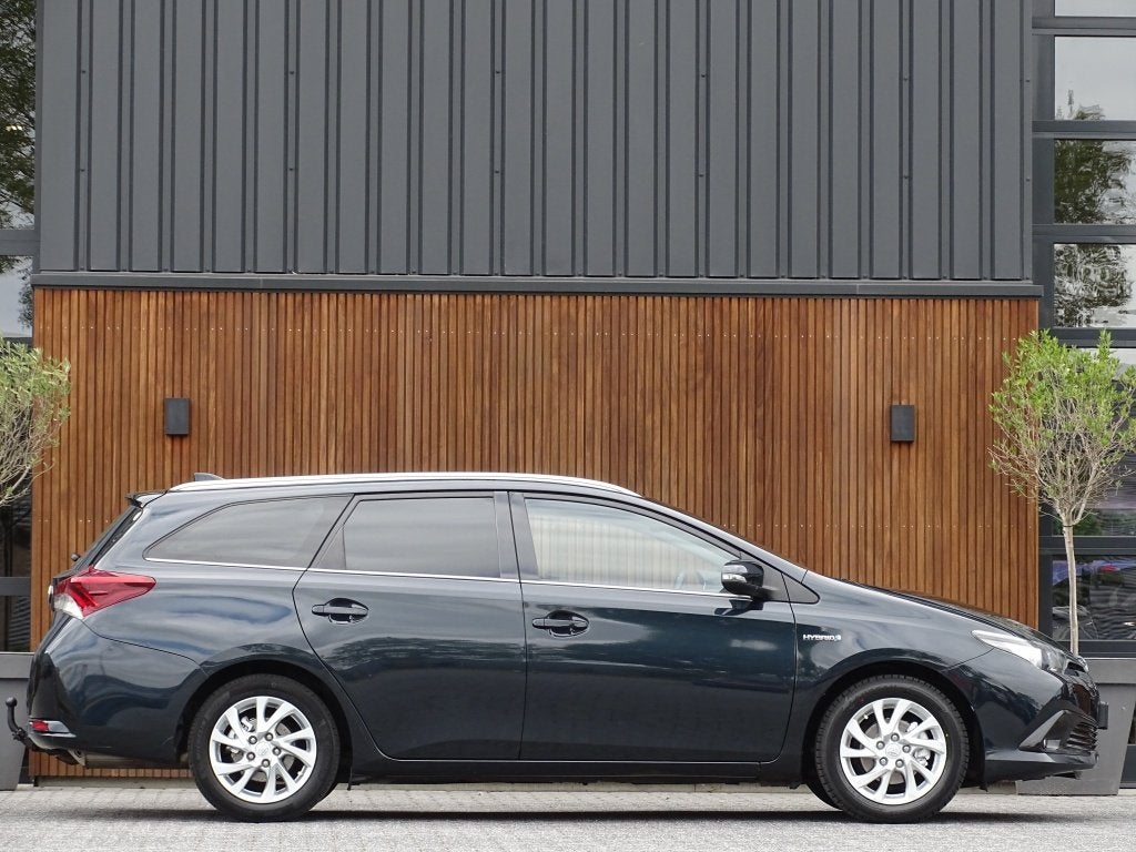 Toyota Auris Touring Sports 1.8 Hybrid 136PK / Dynamic Edit, Auto's, Automaat, Automatische klimaatregeling, Gebruikt, Euro 6