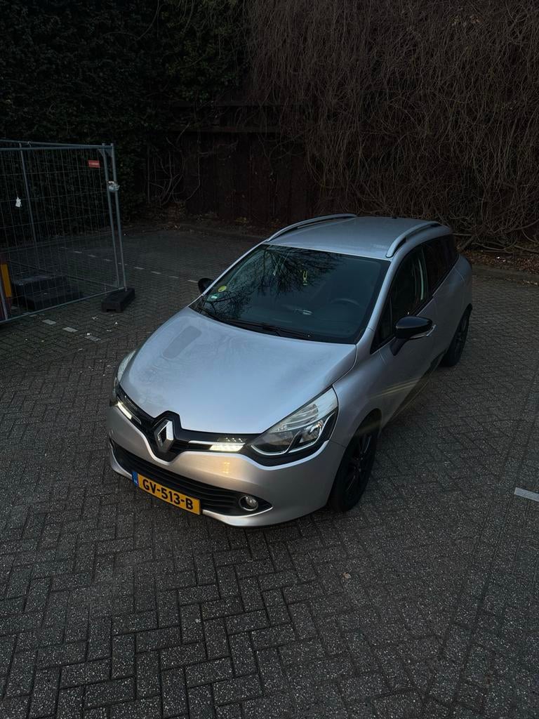 Renault Clio 1.5 DCI 66KW Estate 2015 Grijs, Auto's, Voorwielaandrijving, Euro 5, 4 cilinders, 1096 kg