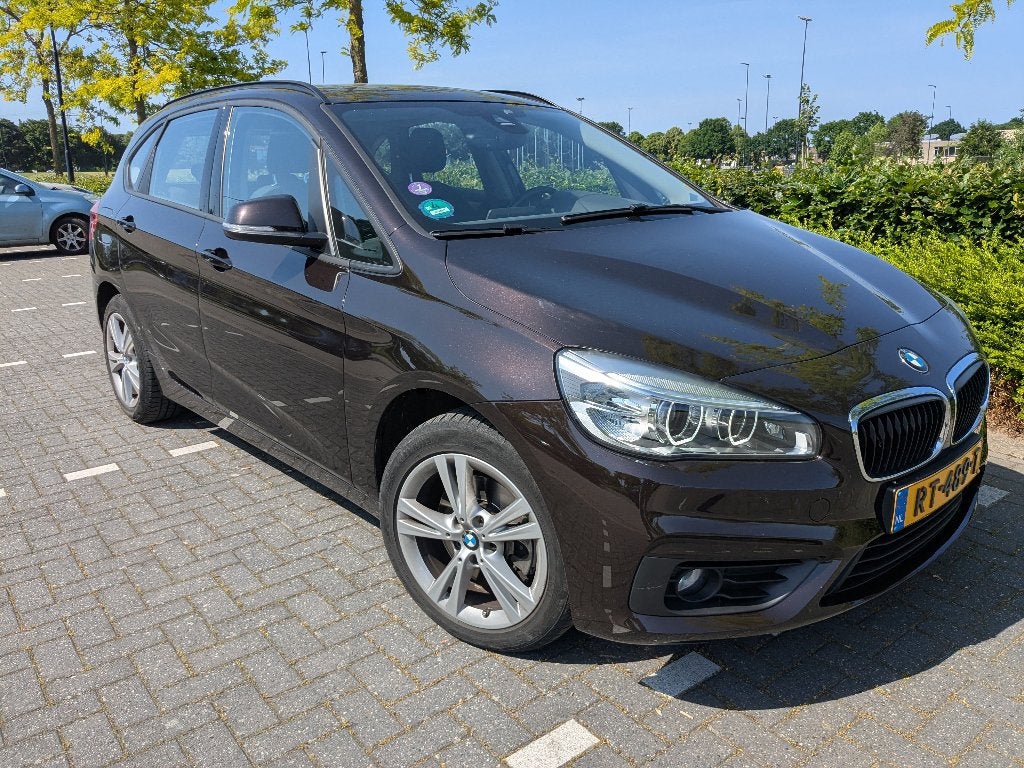 BMW 2-Serie Active Tourer 220i 192pk Aut 2017 Bruin, 1998 cc, Zwart, Bruin, Leder en Stof