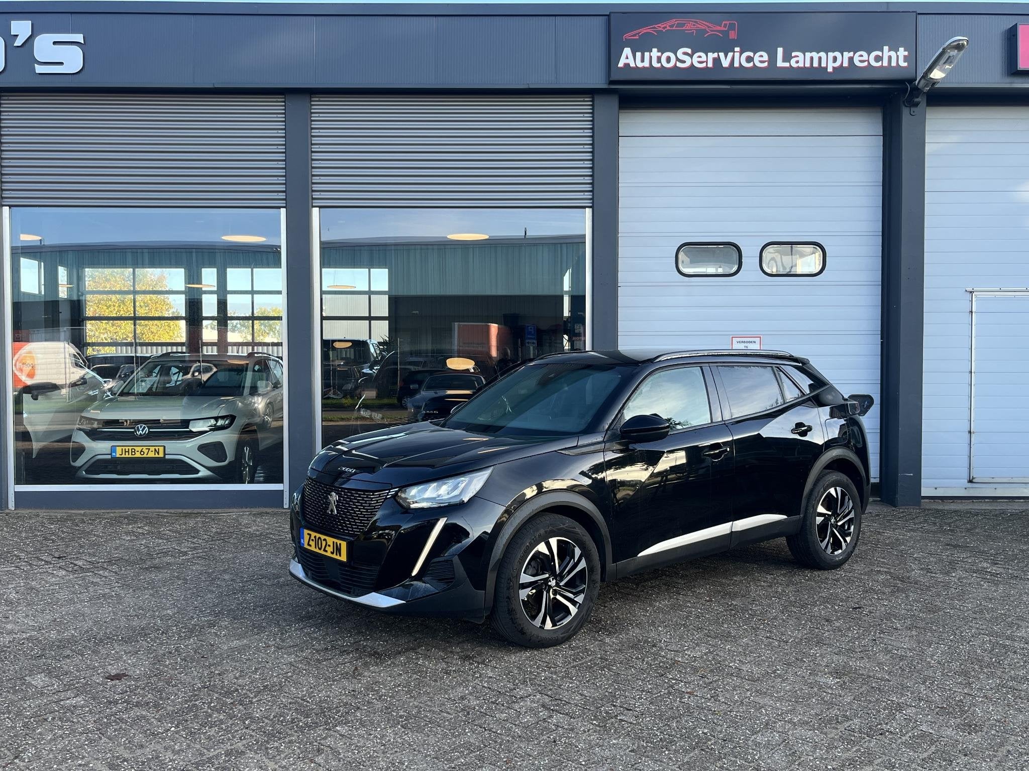 Peugeot 2008 1.2 PureTech Style, Stof, Gebruikt, Euro 6, Zwart
