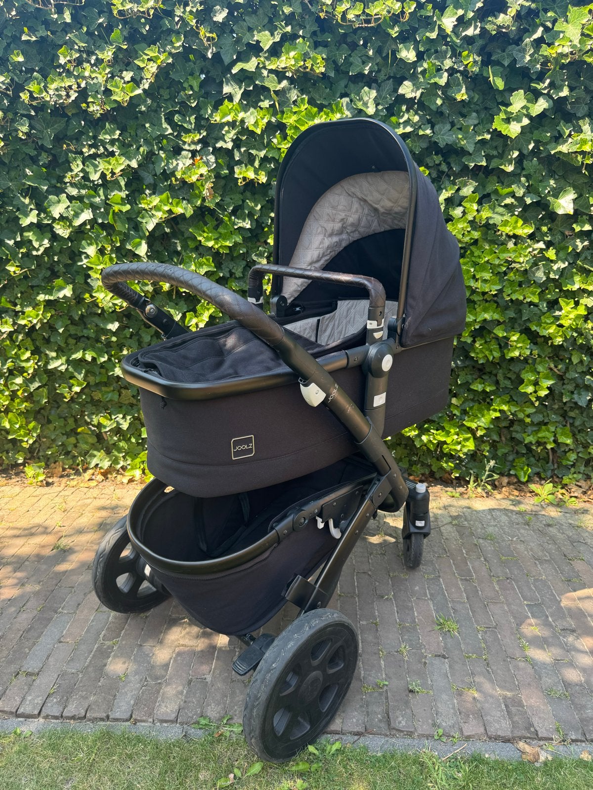 Joolz Geo kinderwagen Zwart met Bruin Leer en Accessoires, Gebruikt, Combiwagen, Met autostoeltje, Ophalen